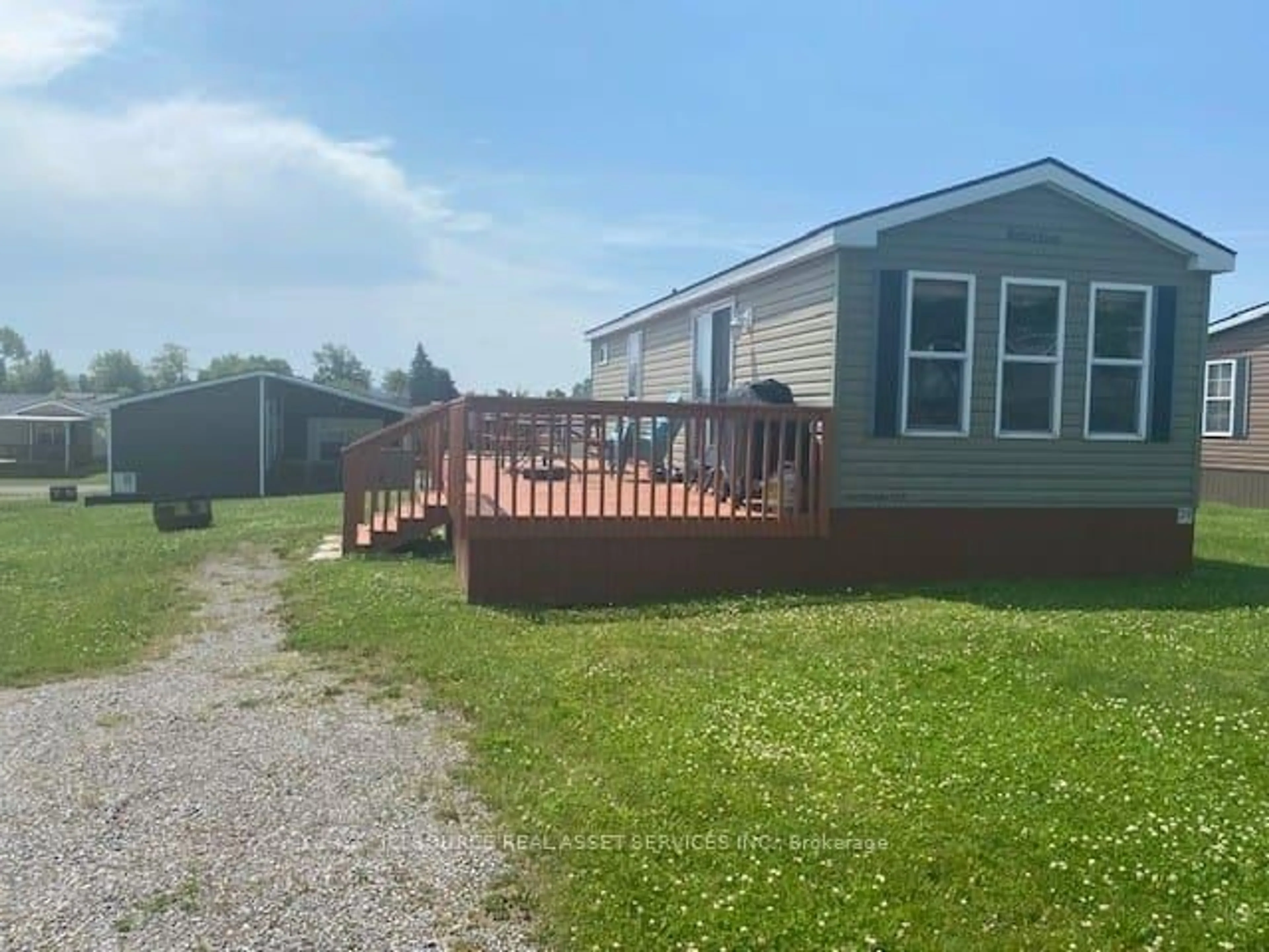 A pic from outside/outdoor area/front of a property/back of a property/a pic from drone, unknown for 1235 Villiers Line #LAC029, Otonabee-South Monaghan Ontario K0L 2G0