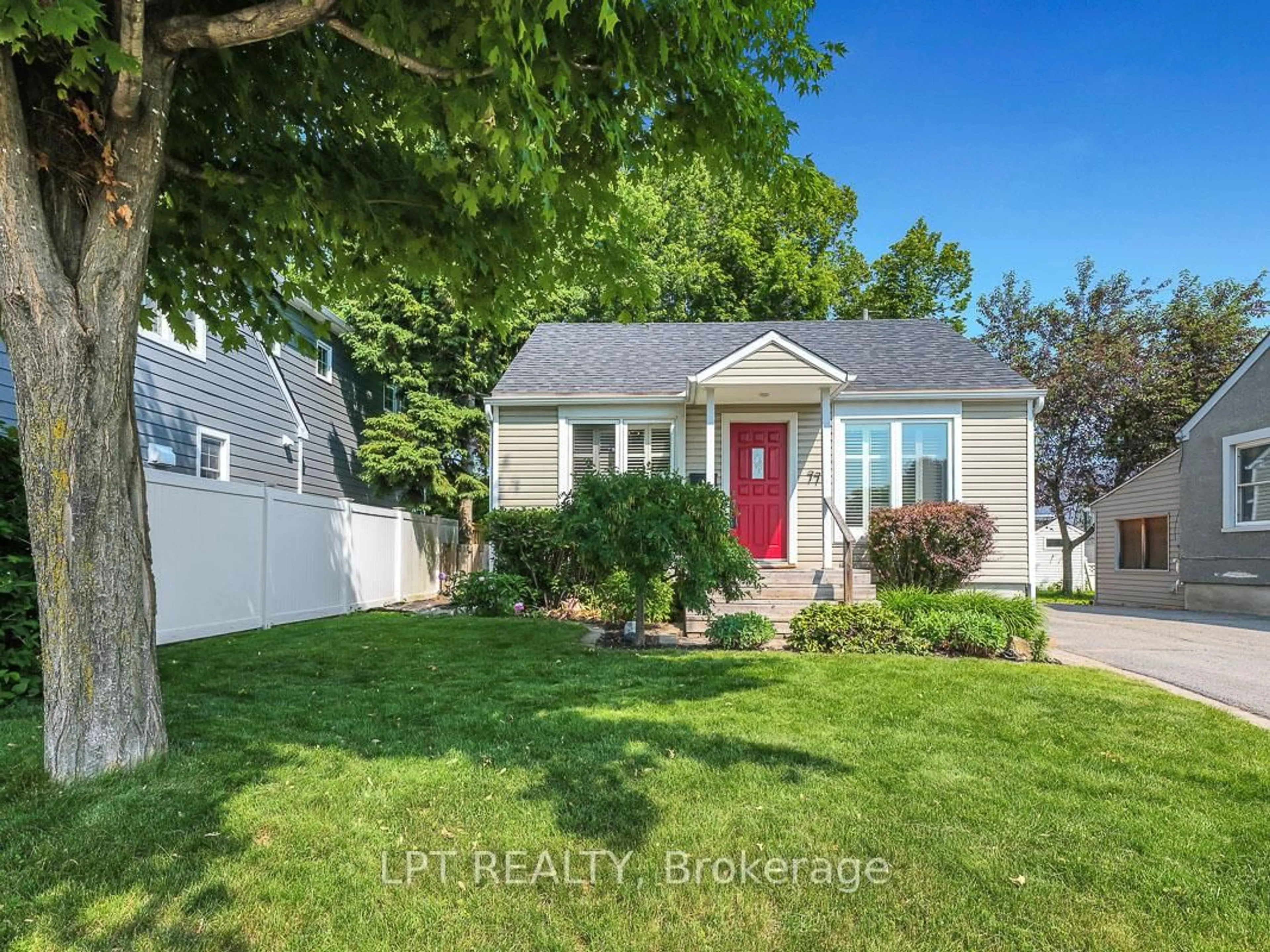 Home with vinyl exterior material, street for 77 Harrold Pl, Ottawa Ontario K1Z 7N7