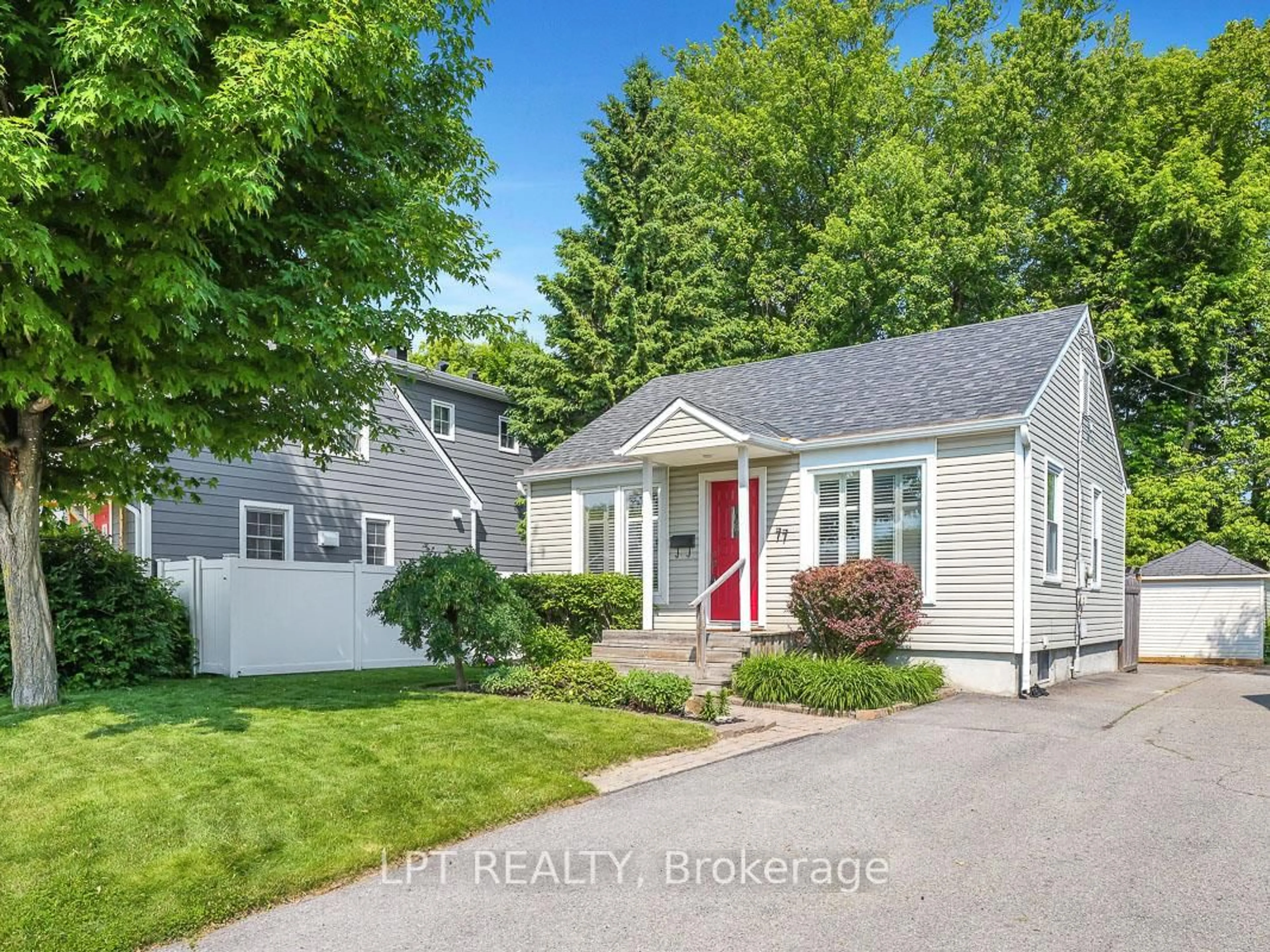 Home with vinyl exterior material, street for 77 Harrold Pl, Ottawa Ontario K1Z 7N7