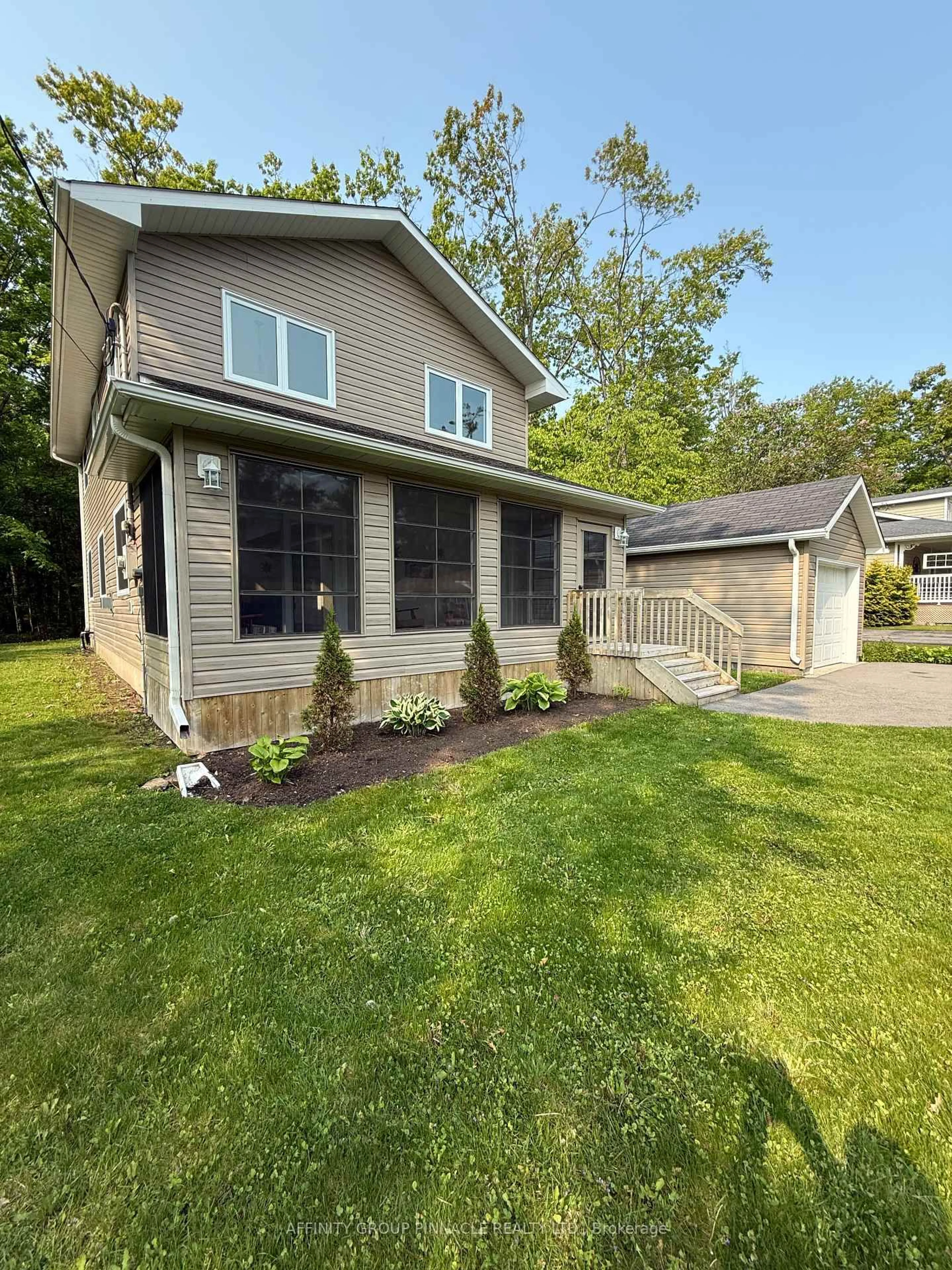 Home with vinyl exterior material, street for 34 Pleasant View Dr, Kawartha Lakes Ontario K0M 1N0