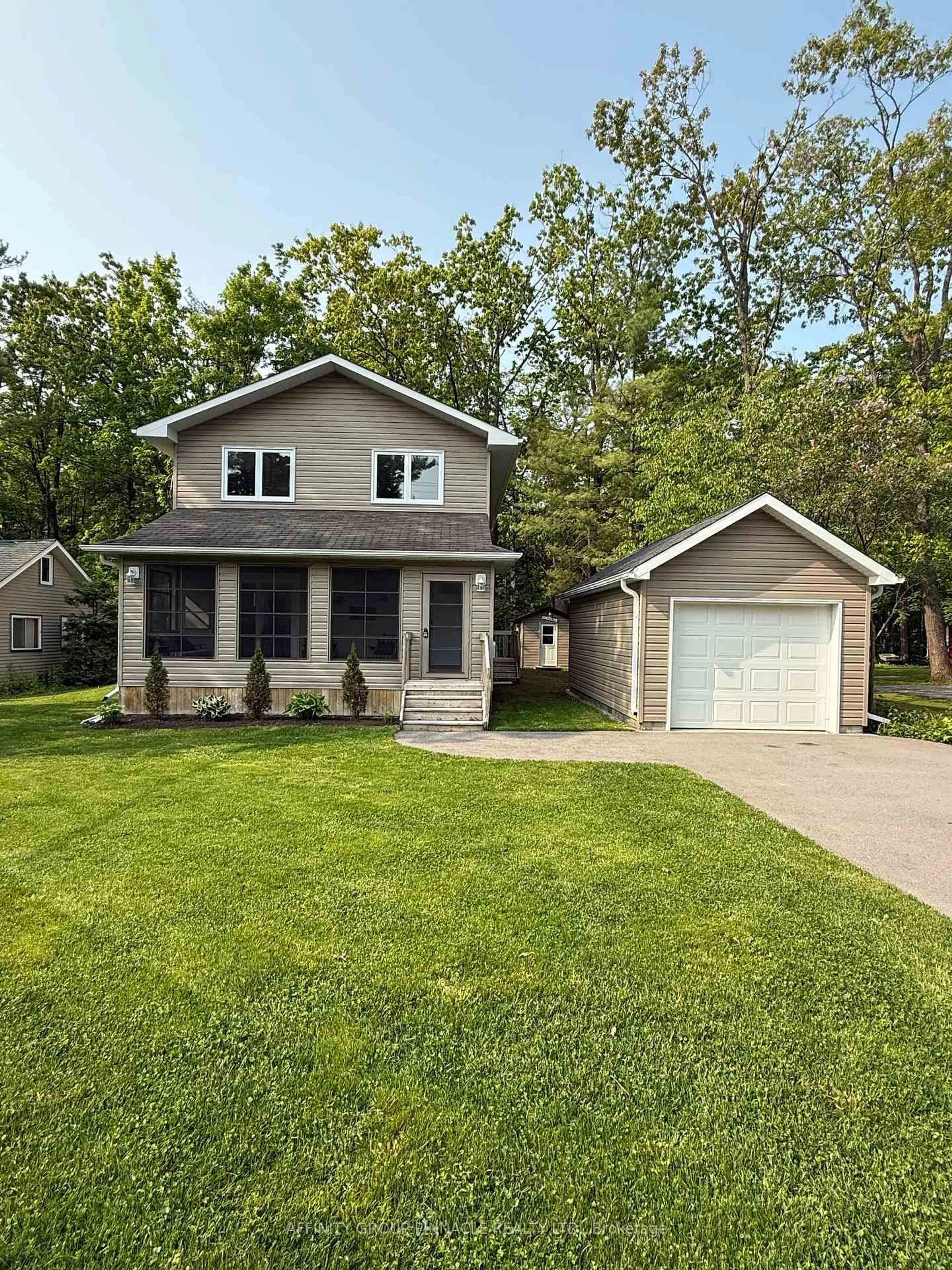 Home with vinyl exterior material, street for 34 Pleasant View Dr, Kawartha Lakes Ontario K0M 1N0