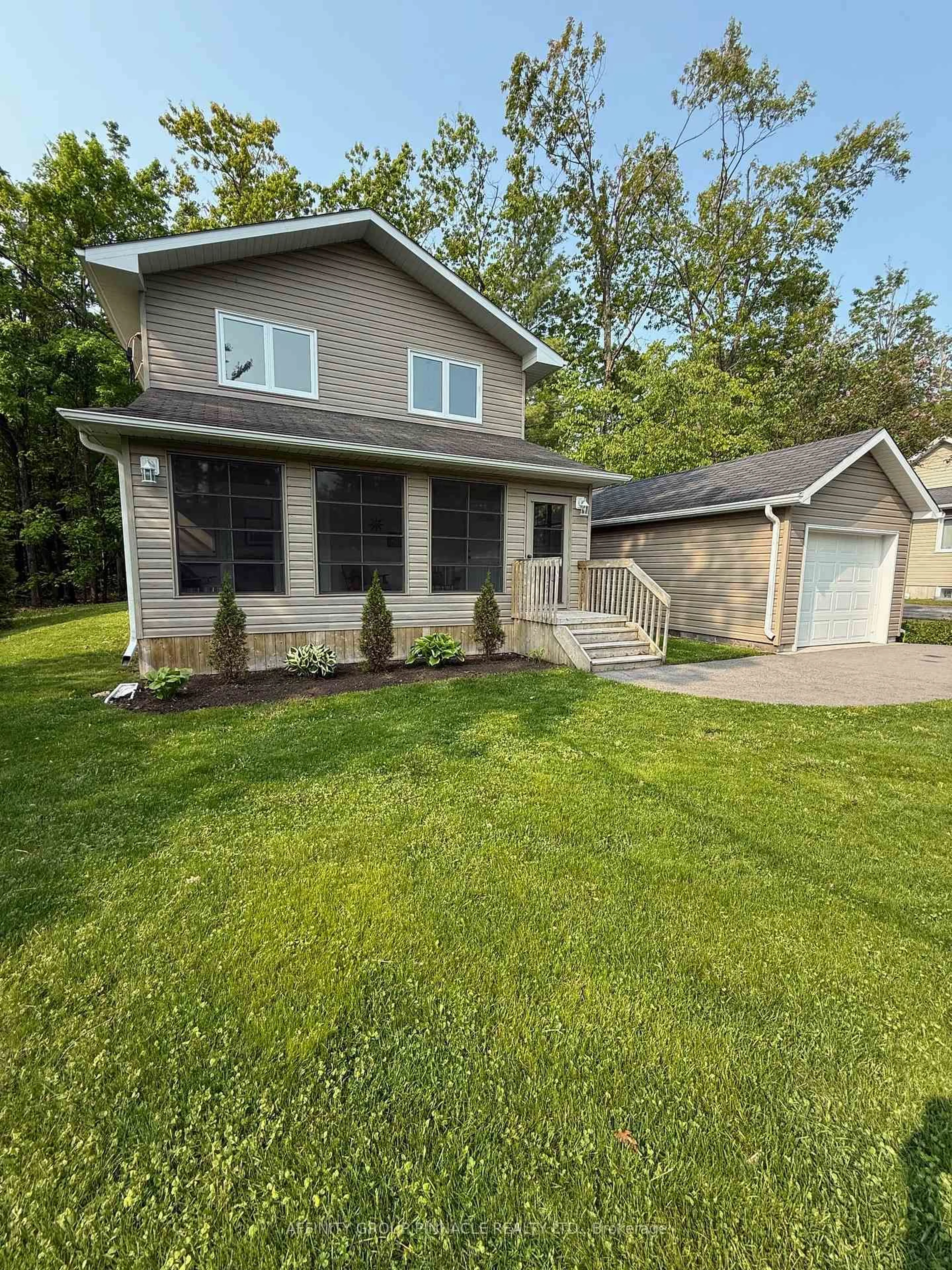 Home with vinyl exterior material, street for 34 Pleasant View Dr, Kawartha Lakes Ontario K0M 1N0