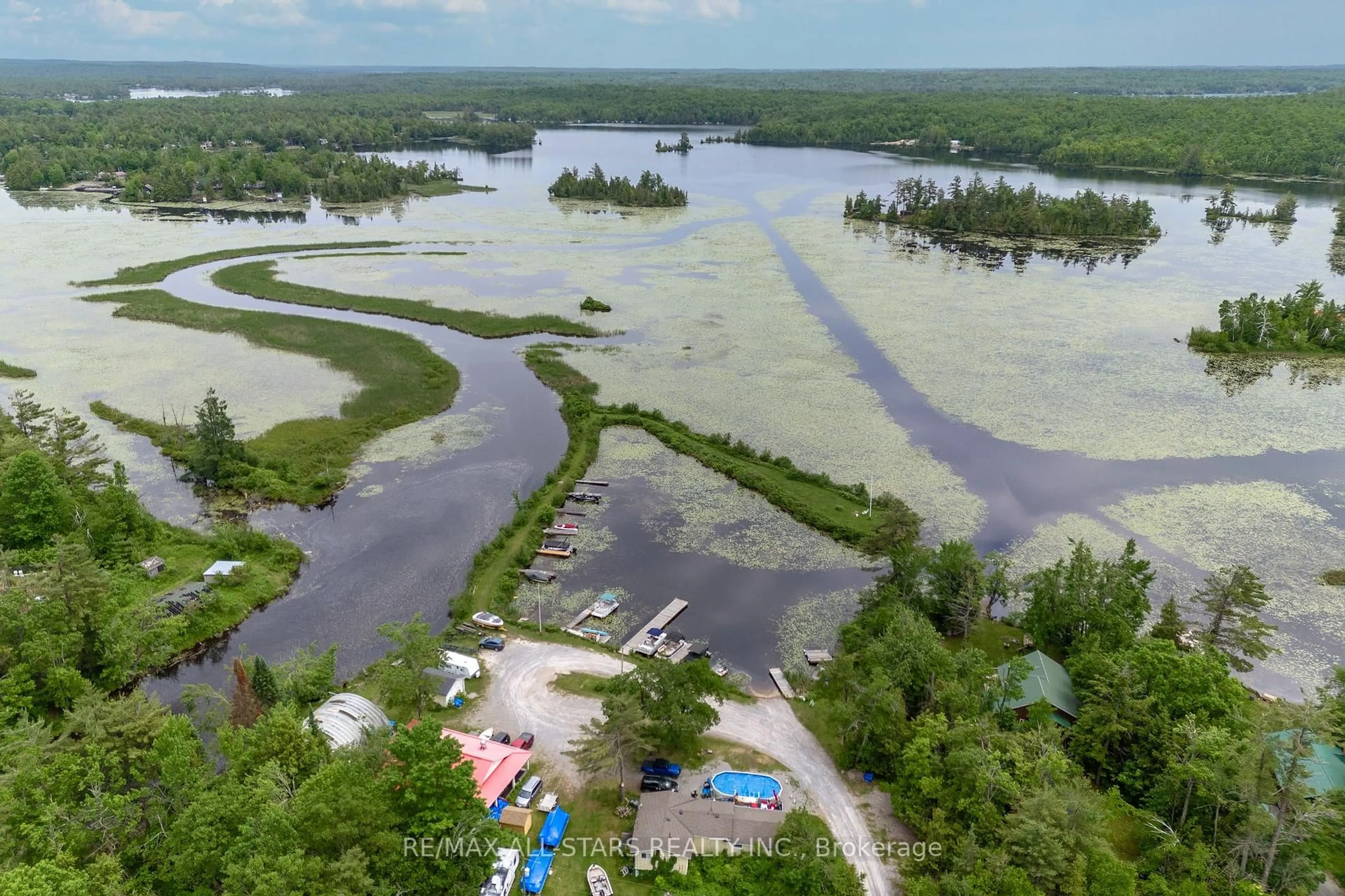A pic from outside/outdoor area/front of a property/back of a property/a pic from drone, water/lake/river/ocean view for 93 Northern Ave, Trent Lakes Ontario K0M 1A0