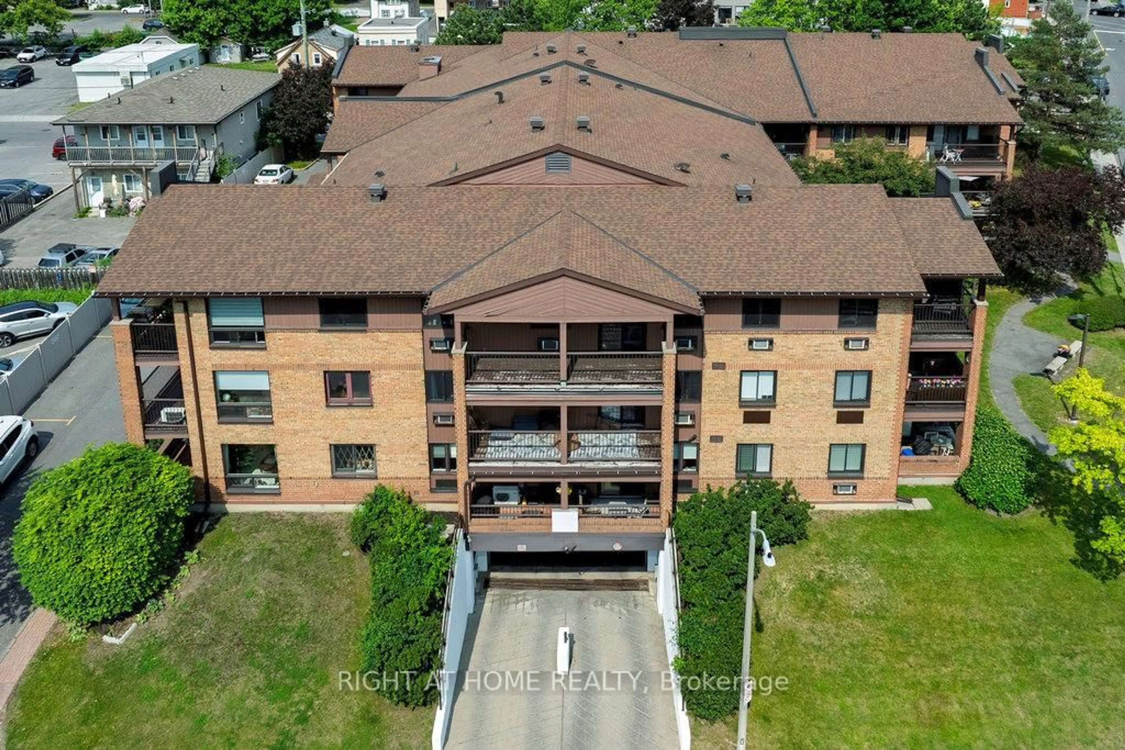 A pic from outside/outdoor area/front of a property/back of a property/a pic from drone, building for 316 Savard Ave #204, Ottawa Ontario K1L 7S2