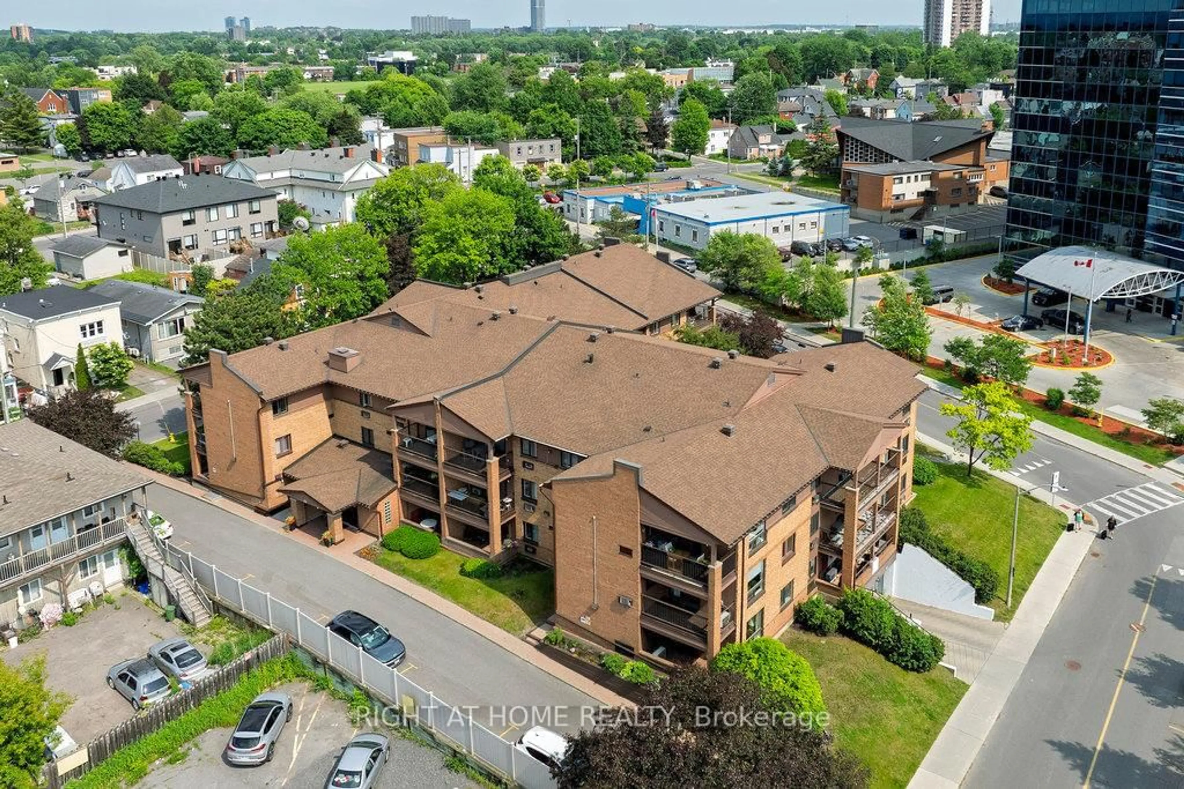 A pic from outside/outdoor area/front of a property/back of a property/a pic from drone, city buildings view from balcony for 316 Savard Ave #204, Ottawa Ontario K1L 7S2