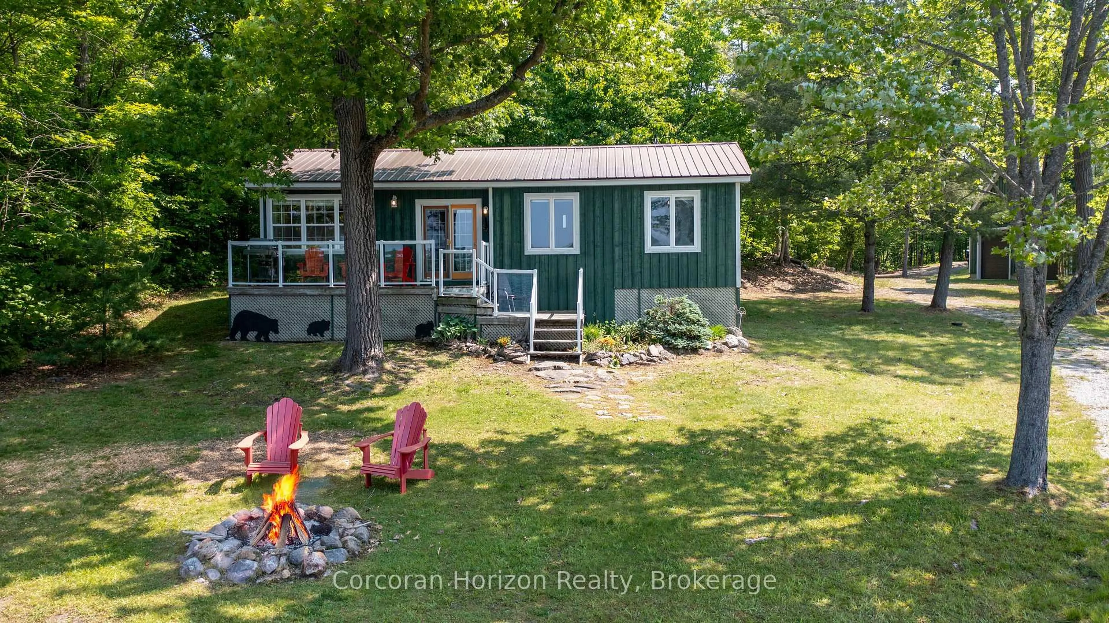A pic from outside/outdoor area/front of a property/back of a property/a pic from drone, water/lake/river/ocean view for 215 SANCTUARY Rd, Georgian Bay Ontario L0K 1S0