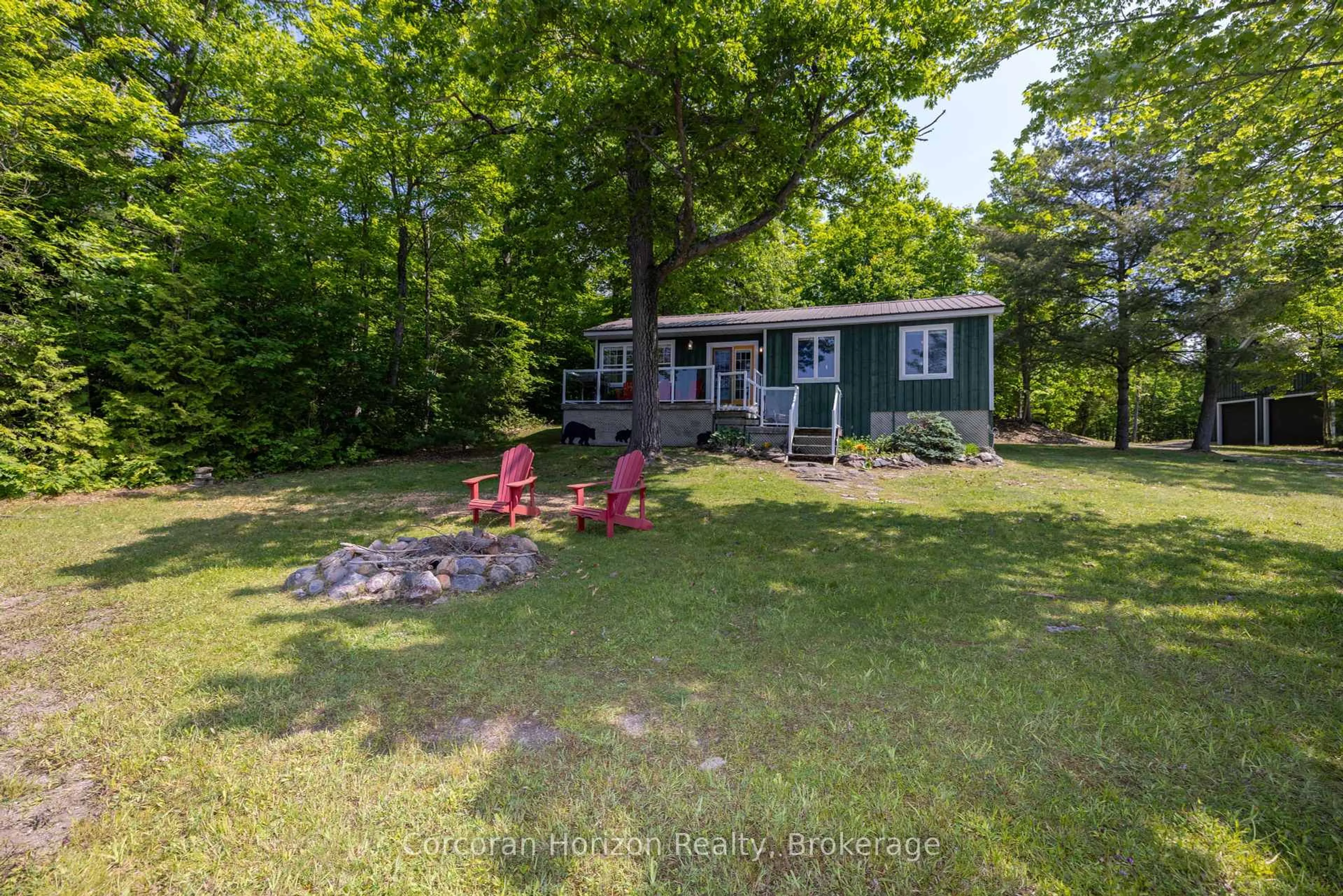 A pic from outside/outdoor area/front of a property/back of a property/a pic from drone, water/lake/river/ocean view for 215 SANCTUARY Rd, Georgian Bay Ontario L0K 1S0