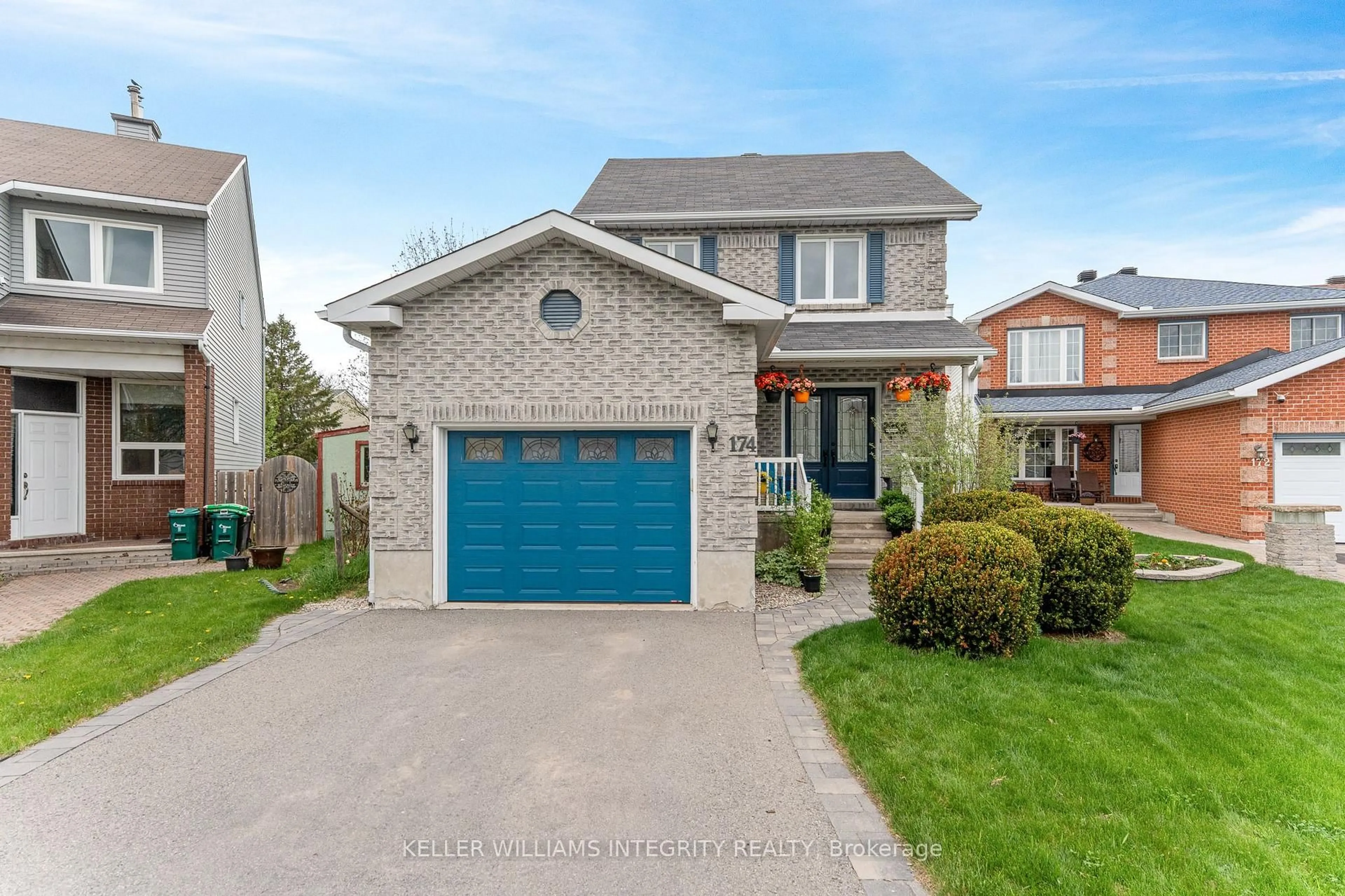 Home with brick exterior material, street for 174 Tartan Dr, Ottawa Ontario K2J 3X3
