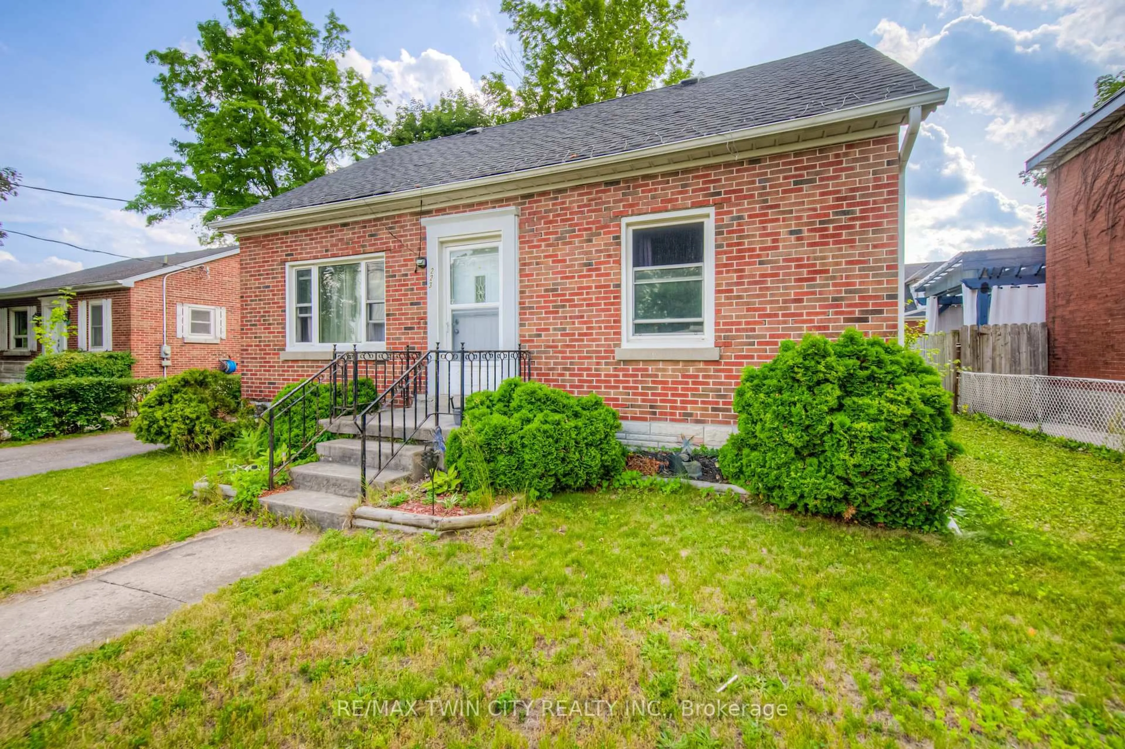 Home with brick exterior material, street for 223 Margaret Ave, Kitchener Ontario N2H 4J1