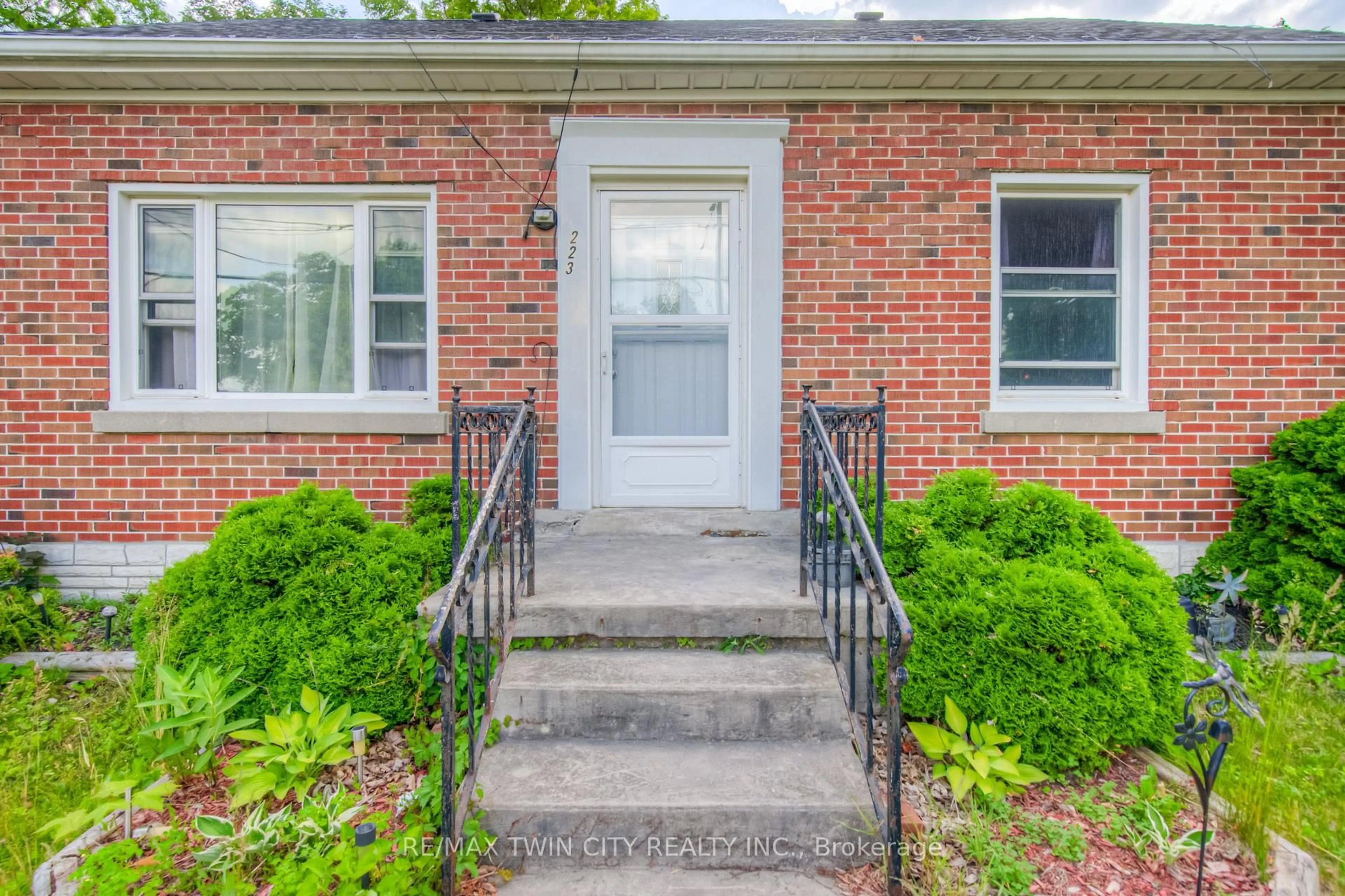 Home with brick exterior material, street for 223 Margaret Ave, Kitchener Ontario N2H 4J1
