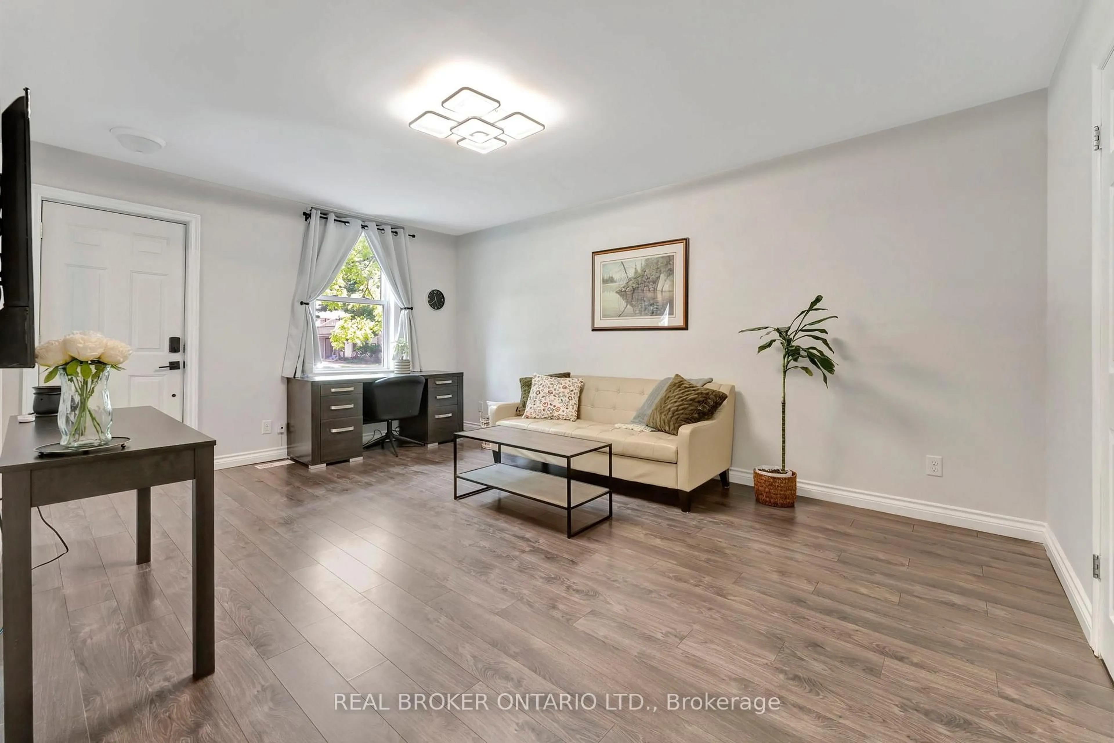 Living room with furniture, wood/laminate floor for 5 Maple Ave, Brant Ontario N0E 1A0