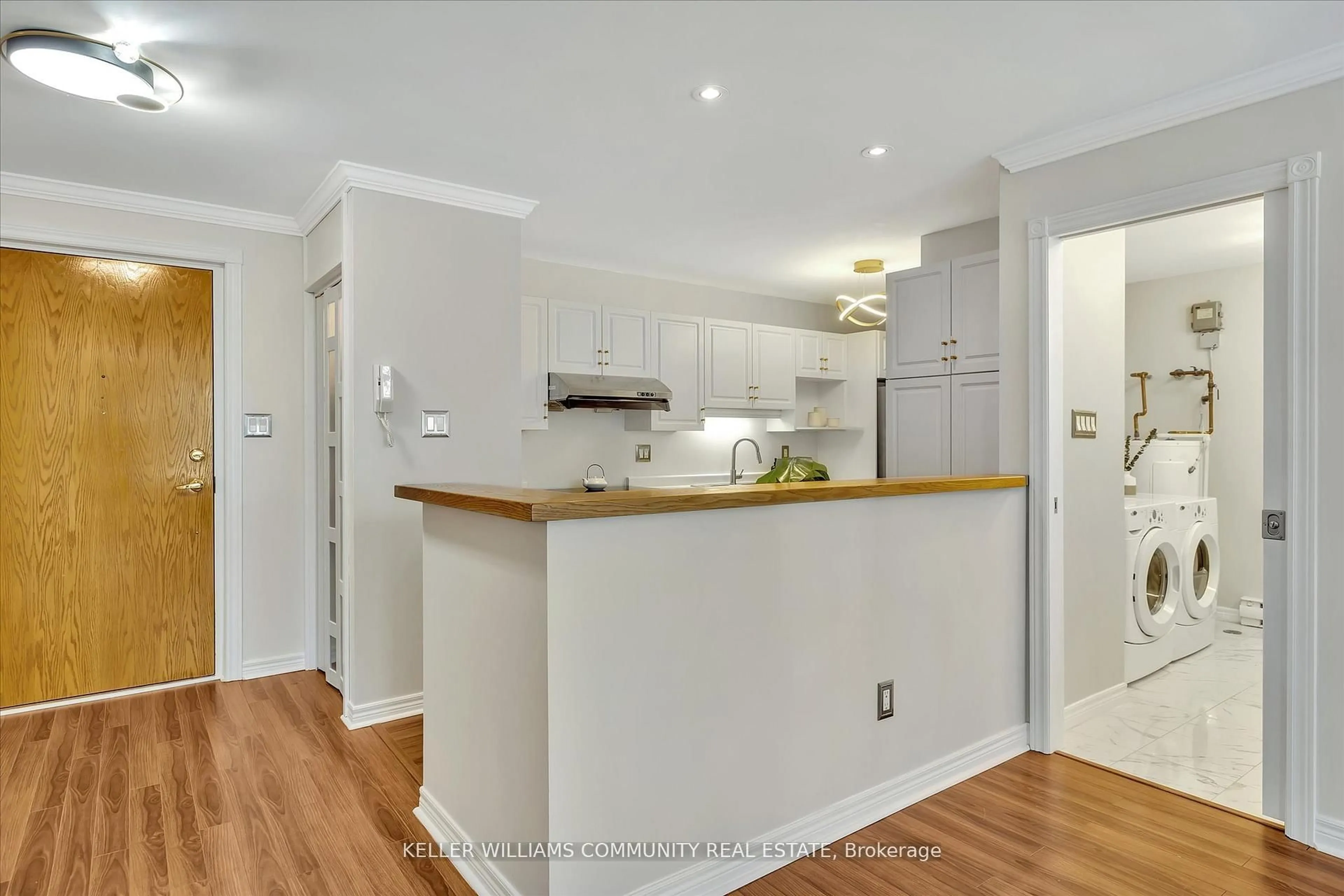 Open concept kitchen, wood/laminate floor for 699 Whitaker St #5, Peterborough East Ontario K9H 7K3