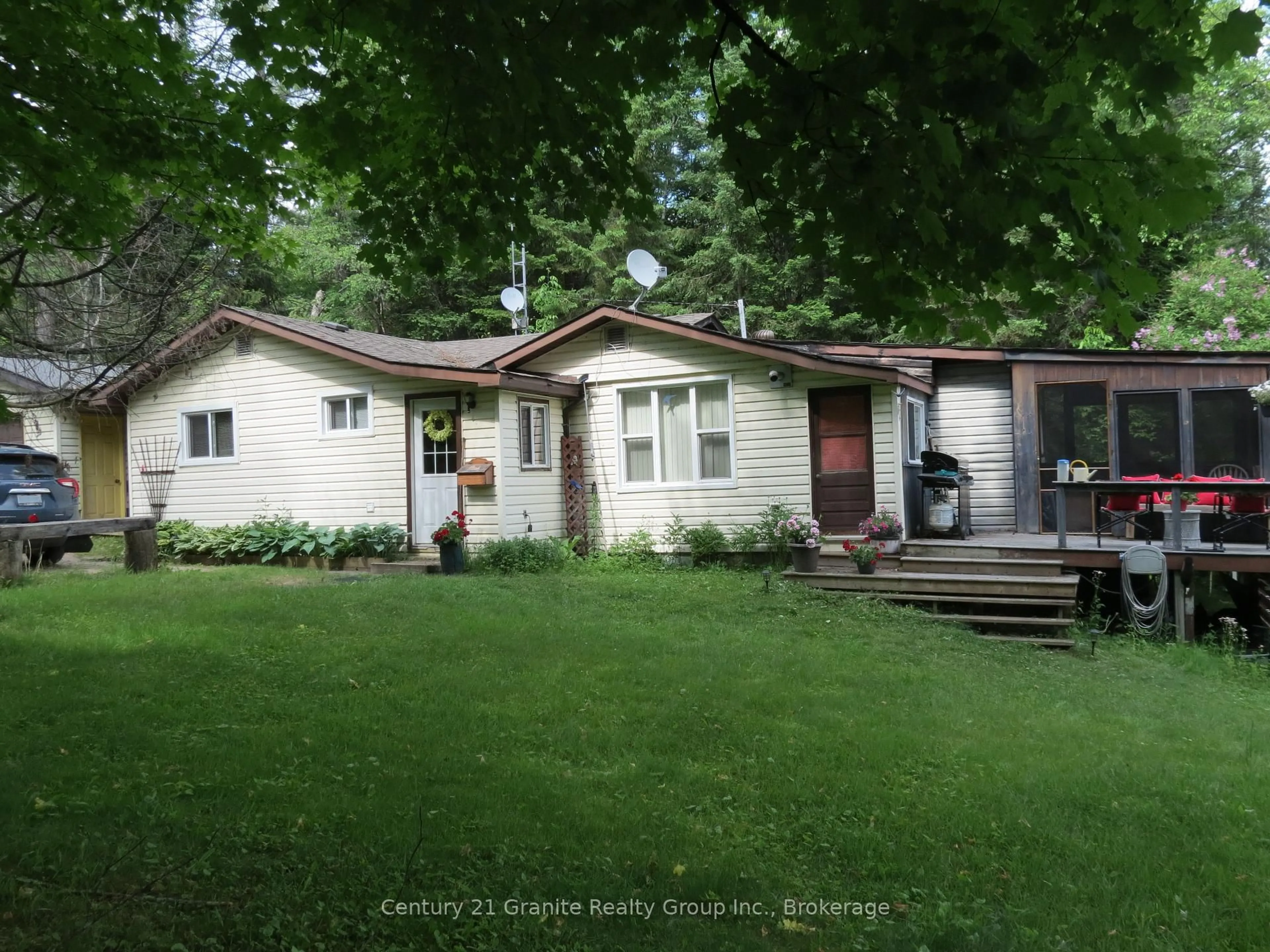 A pic from outside/outdoor area/front of a property/back of a property/a pic from drone, street for 10208 County Rd 503 Rd, Highlands East Ontario K0M 1R0