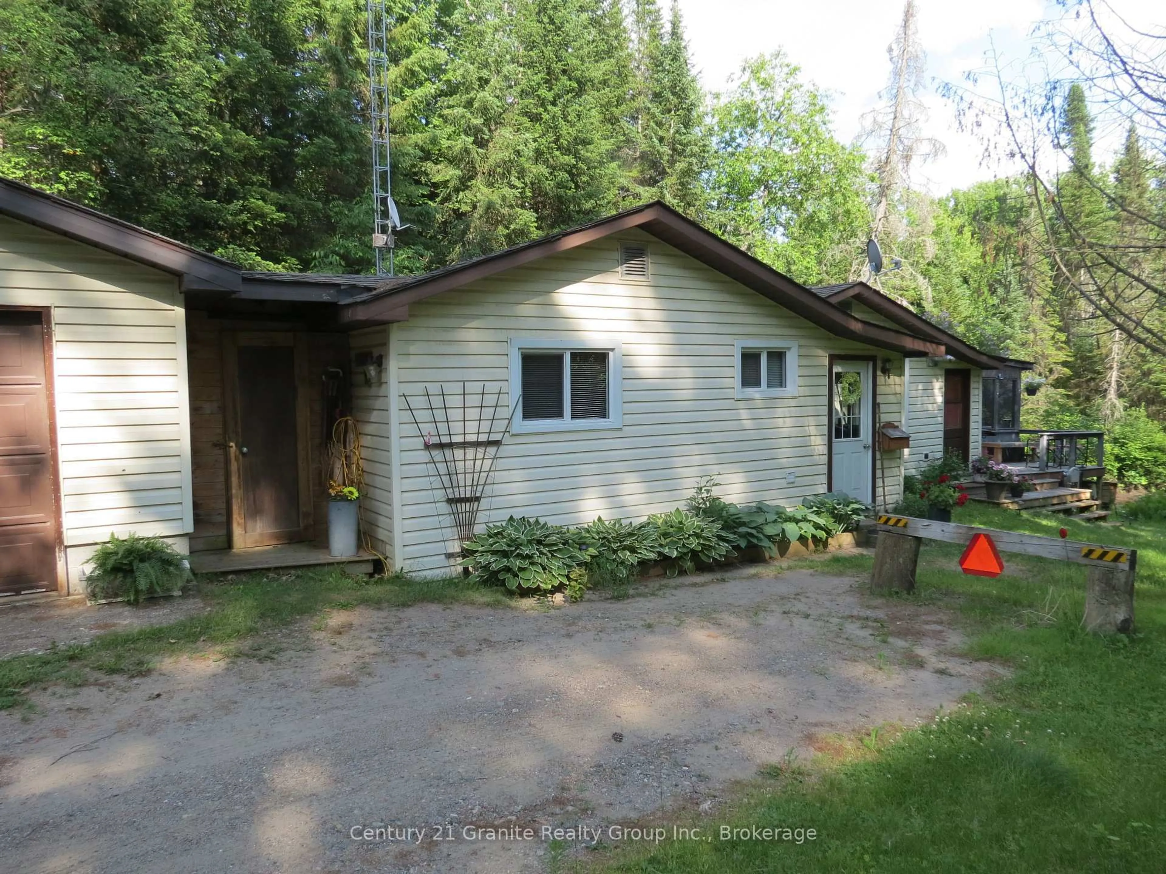 A pic from outside/outdoor area/front of a property/back of a property/a pic from drone, unknown for 10208 County Rd 503 Rd, Highlands East Ontario K0M 1R0