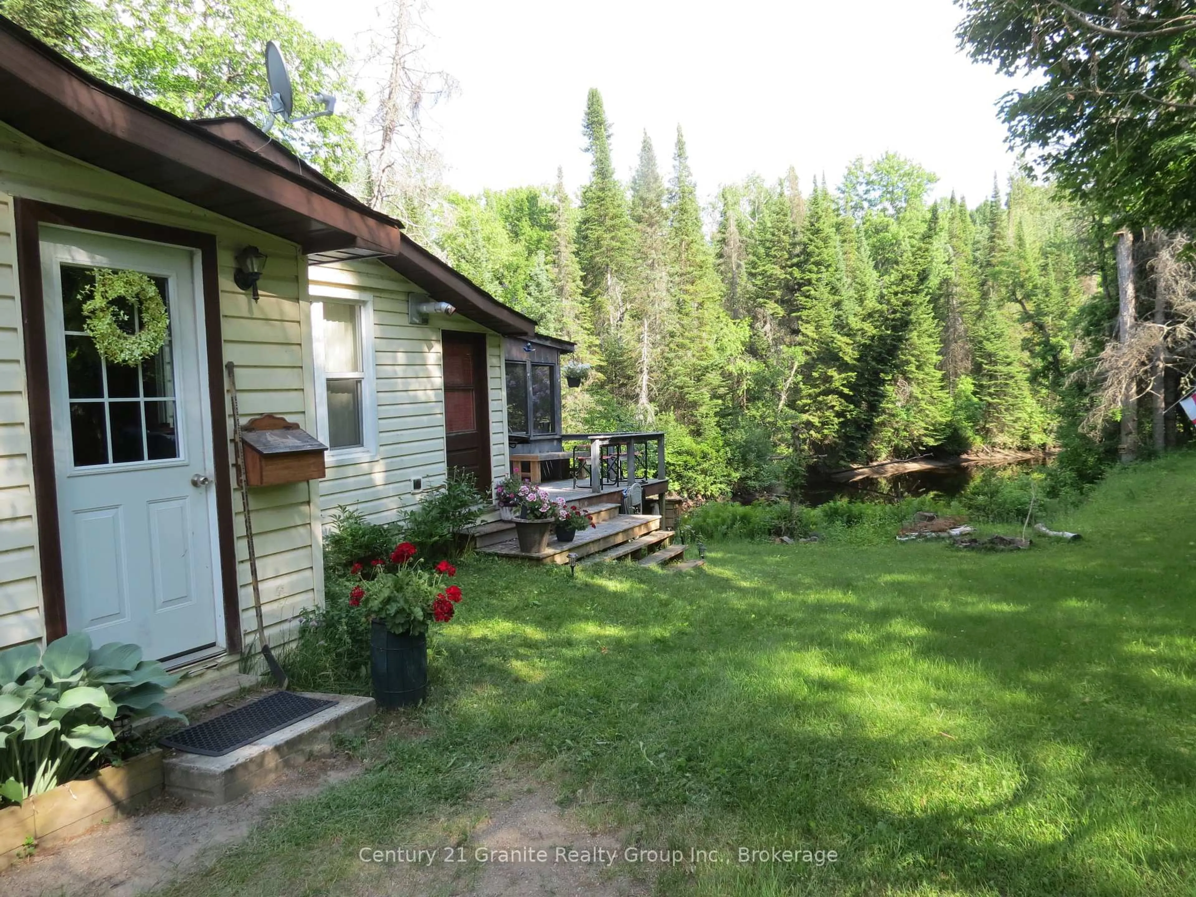 A pic from outside/outdoor area/front of a property/back of a property/a pic from drone, forest/trees view for 10208 County Rd 503 Rd, Highlands East Ontario K0M 1R0