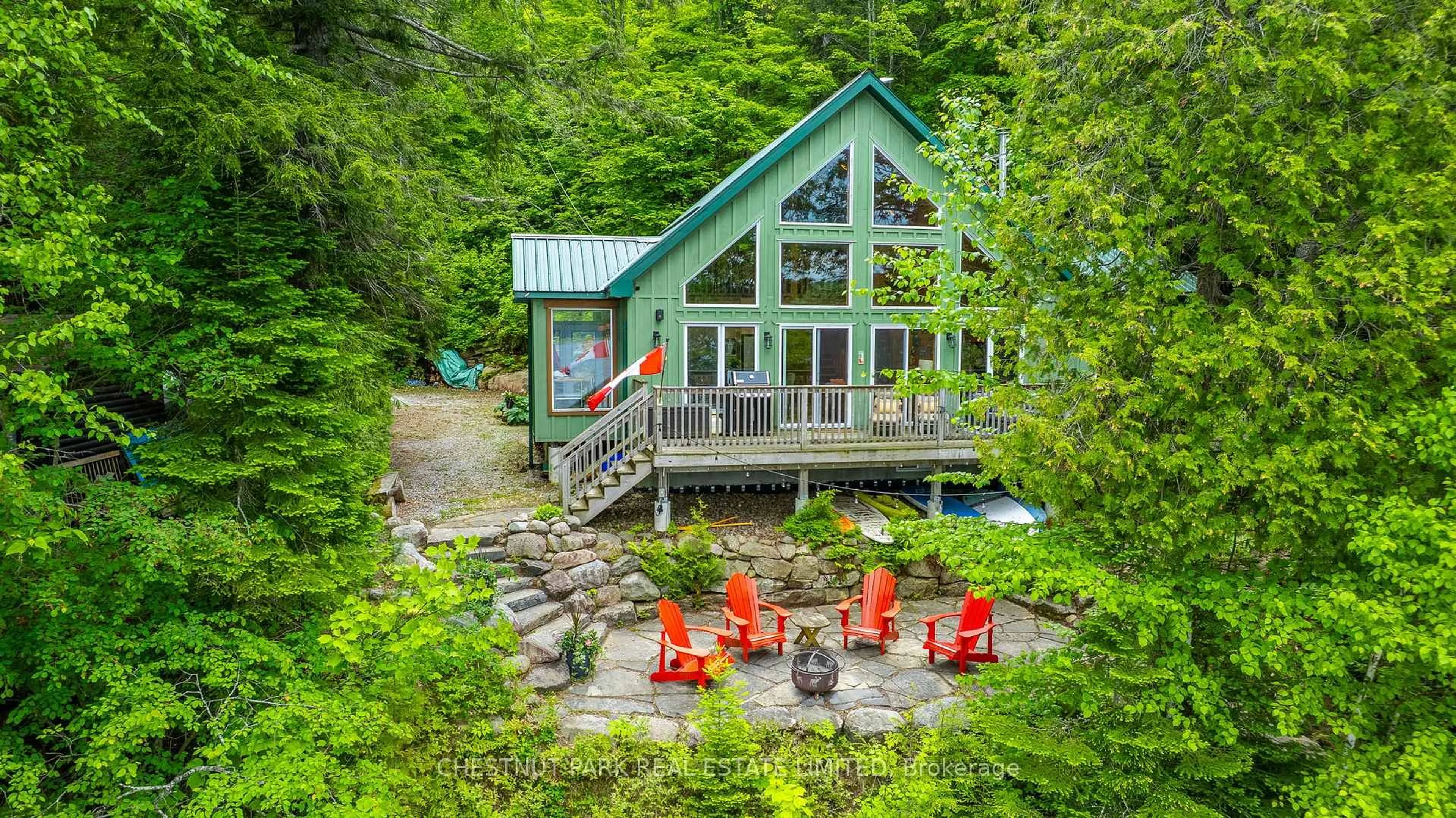 A pic from outside/outdoor area/front of a property/back of a property/a pic from drone, water/lake/river/ocean view for 1029 Badger Lane, Dysart et al Ontario K0M 1S0