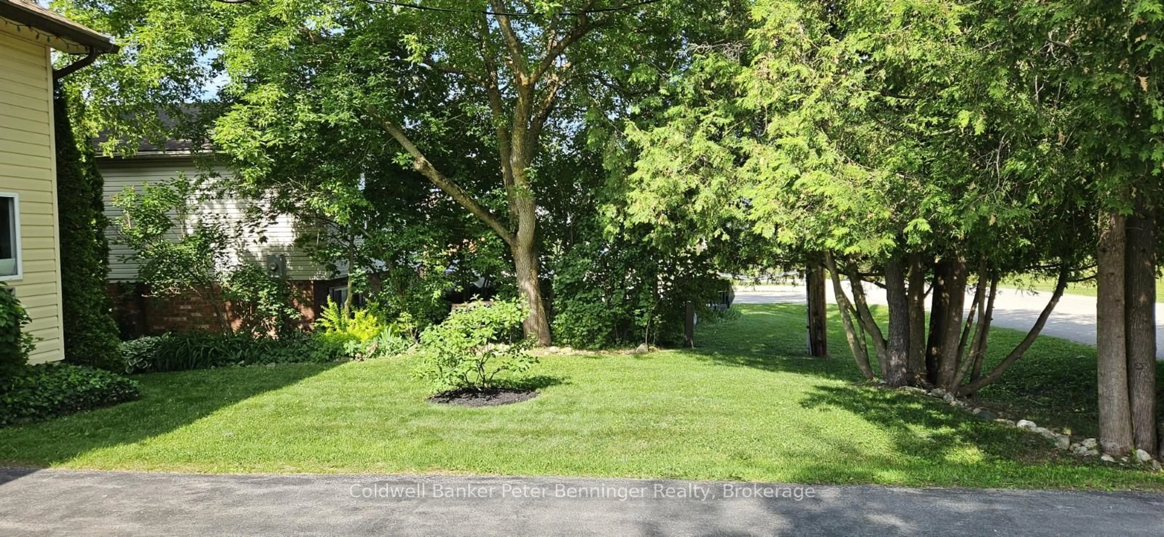 A pic from outside/outdoor area/front of a property/back of a property/a pic from drone, forest/trees view for 594 William St, West Grey Ontario N0G 1R0