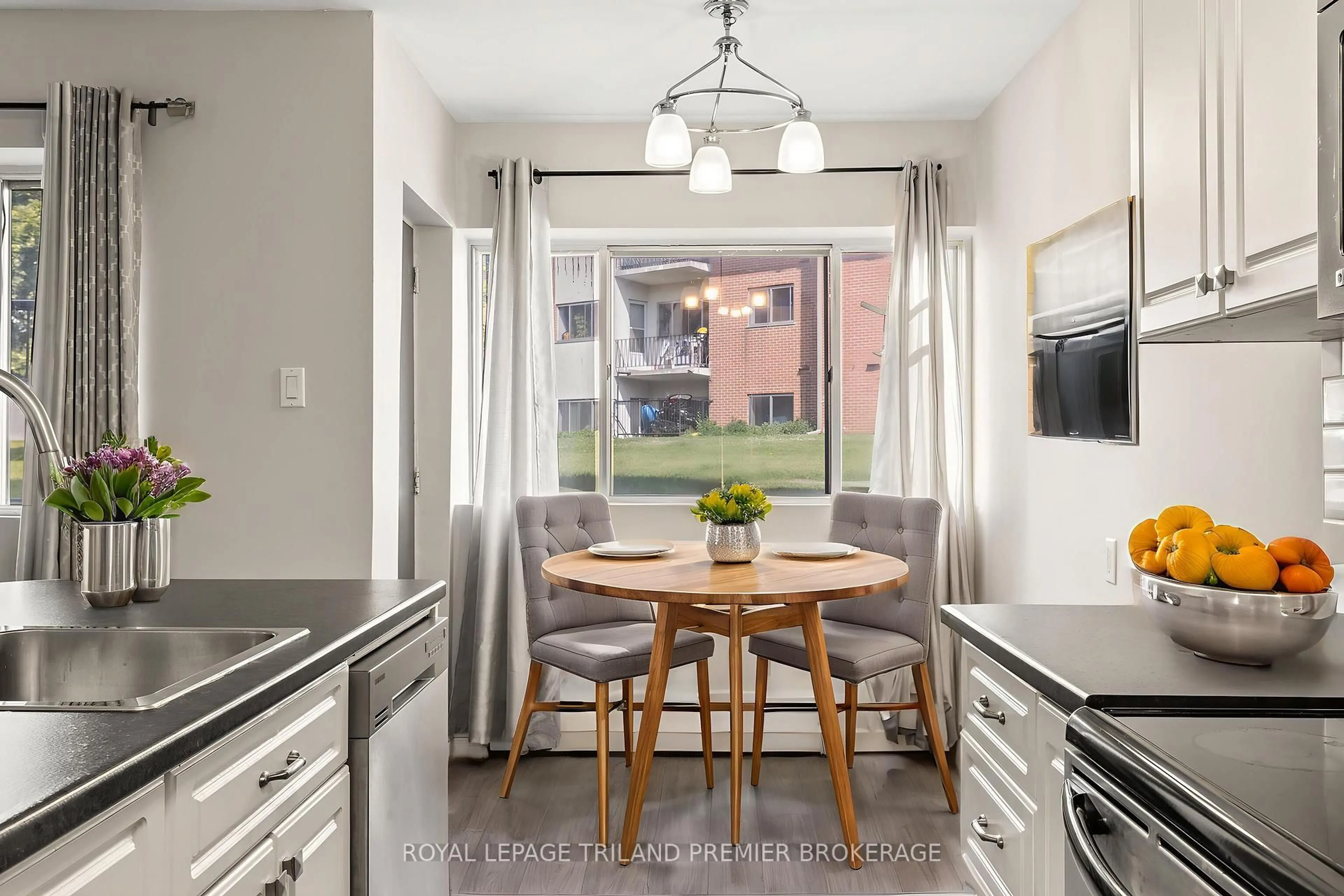 Open concept kitchen, ceramic/tile floor for 1176 Hamilton Rd #109, London East Ontario N5W 1A9