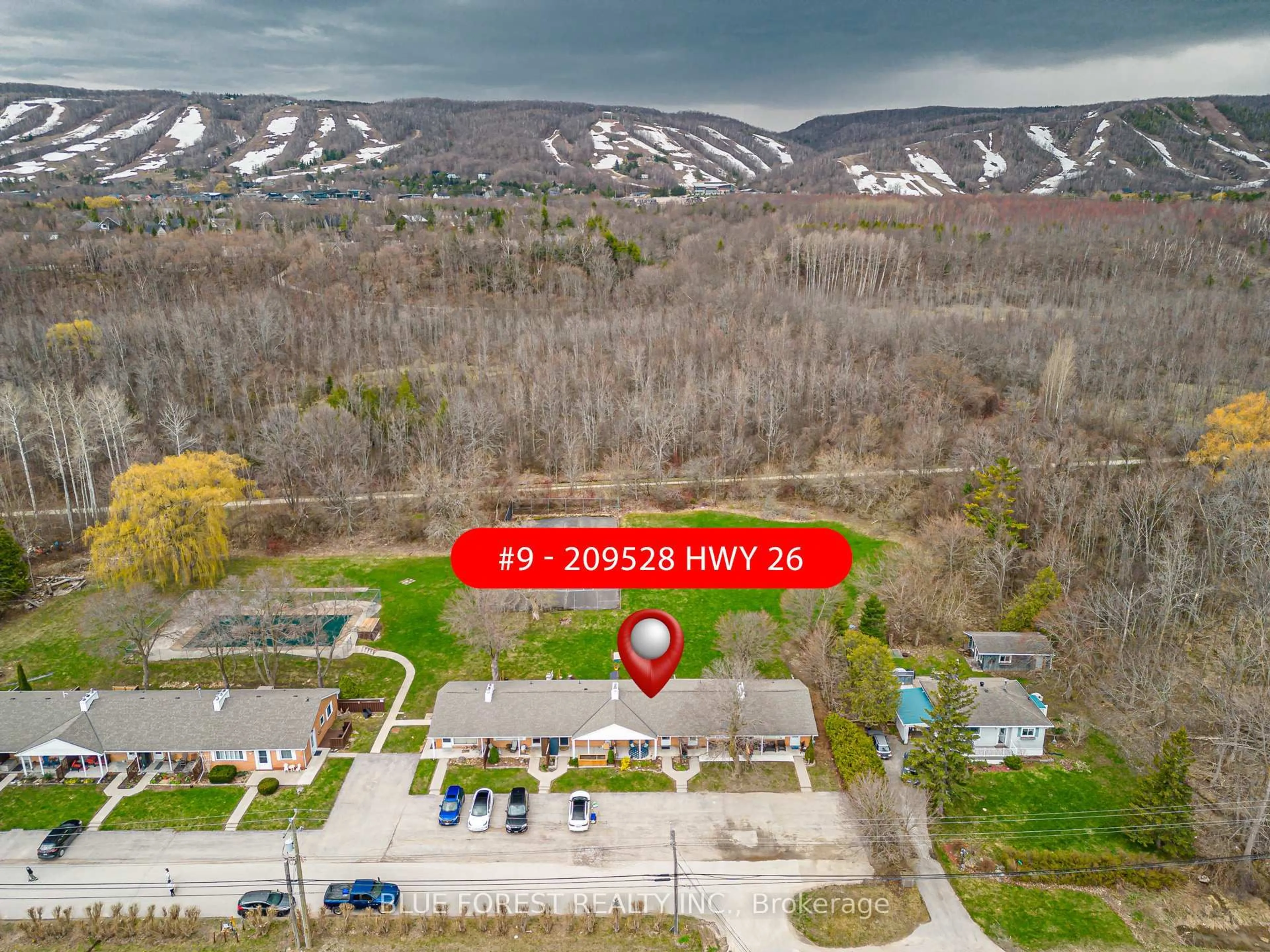 A pic from outside/outdoor area/front of a property/back of a property/a pic from drone, mountain view for 209528 Highway 26 #9, Blue Mountains Ontario L9Y 0T1