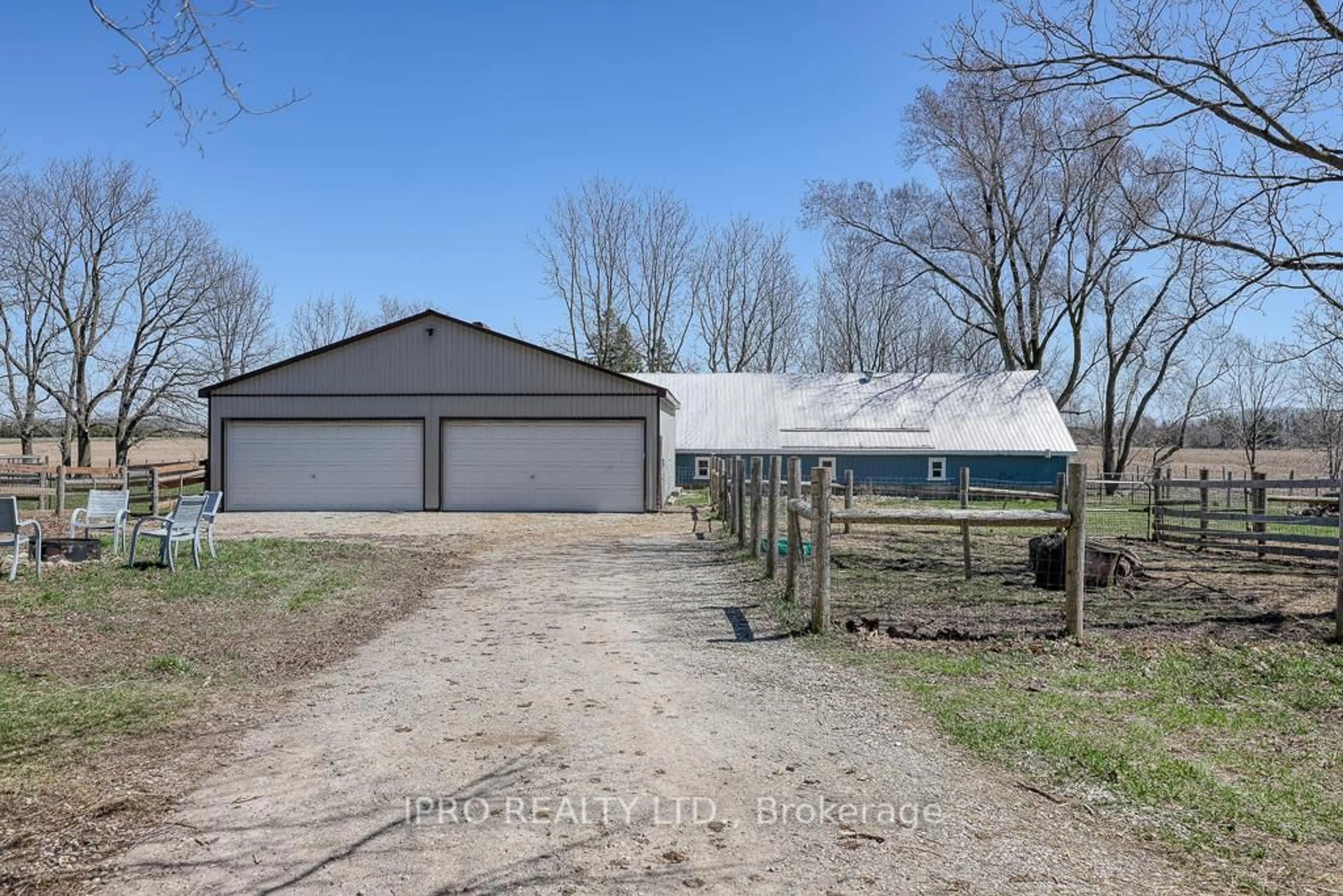 A pic from outside/outdoor area/front of a property/back of a property/a pic from drone, street for 3892 Lewis Rd, Thames Centre Ontario N0L 1V0