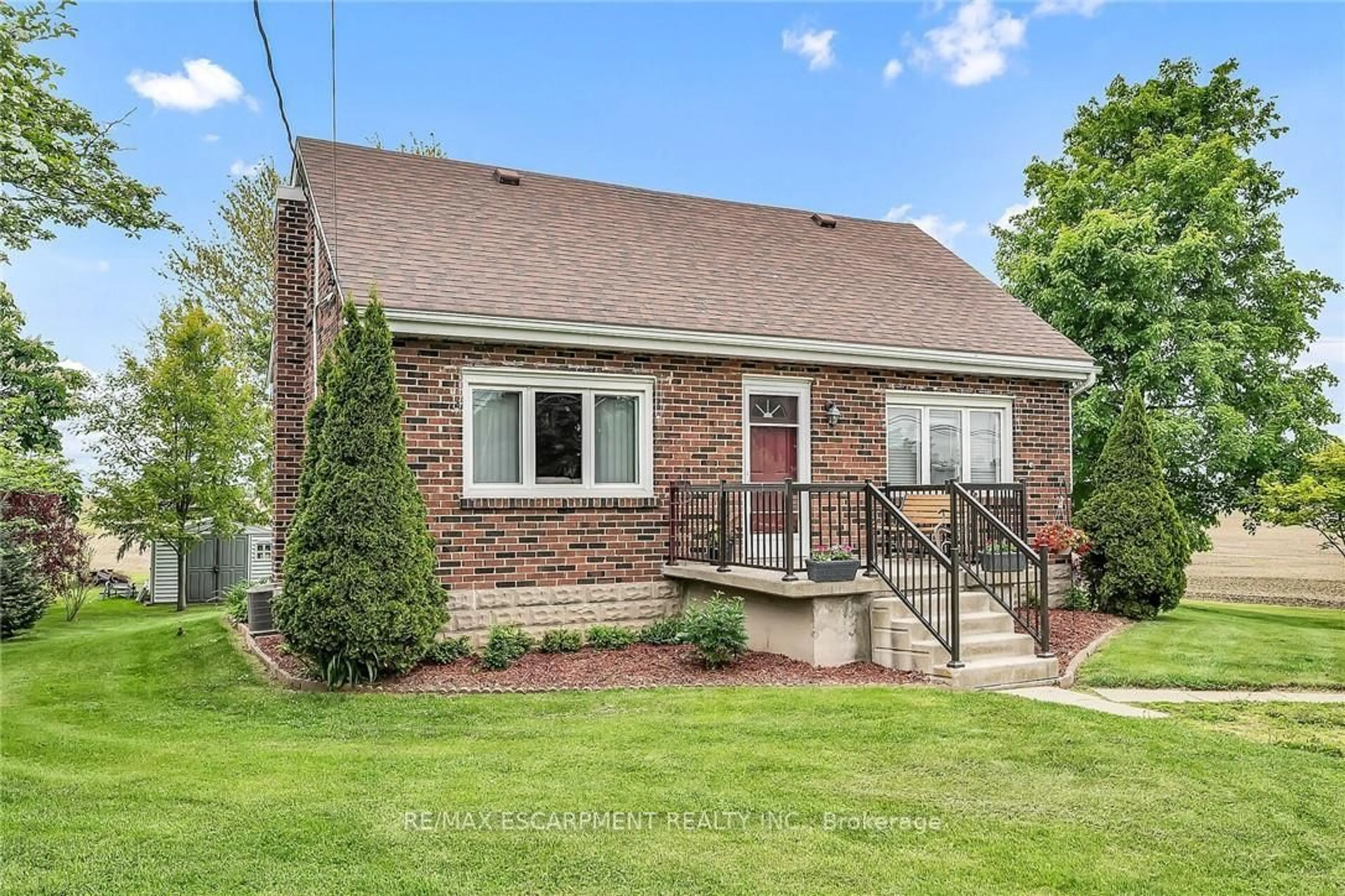 Home with brick exterior material, street for 2439 Wilson St, Hamilton Ontario L0R 1A0