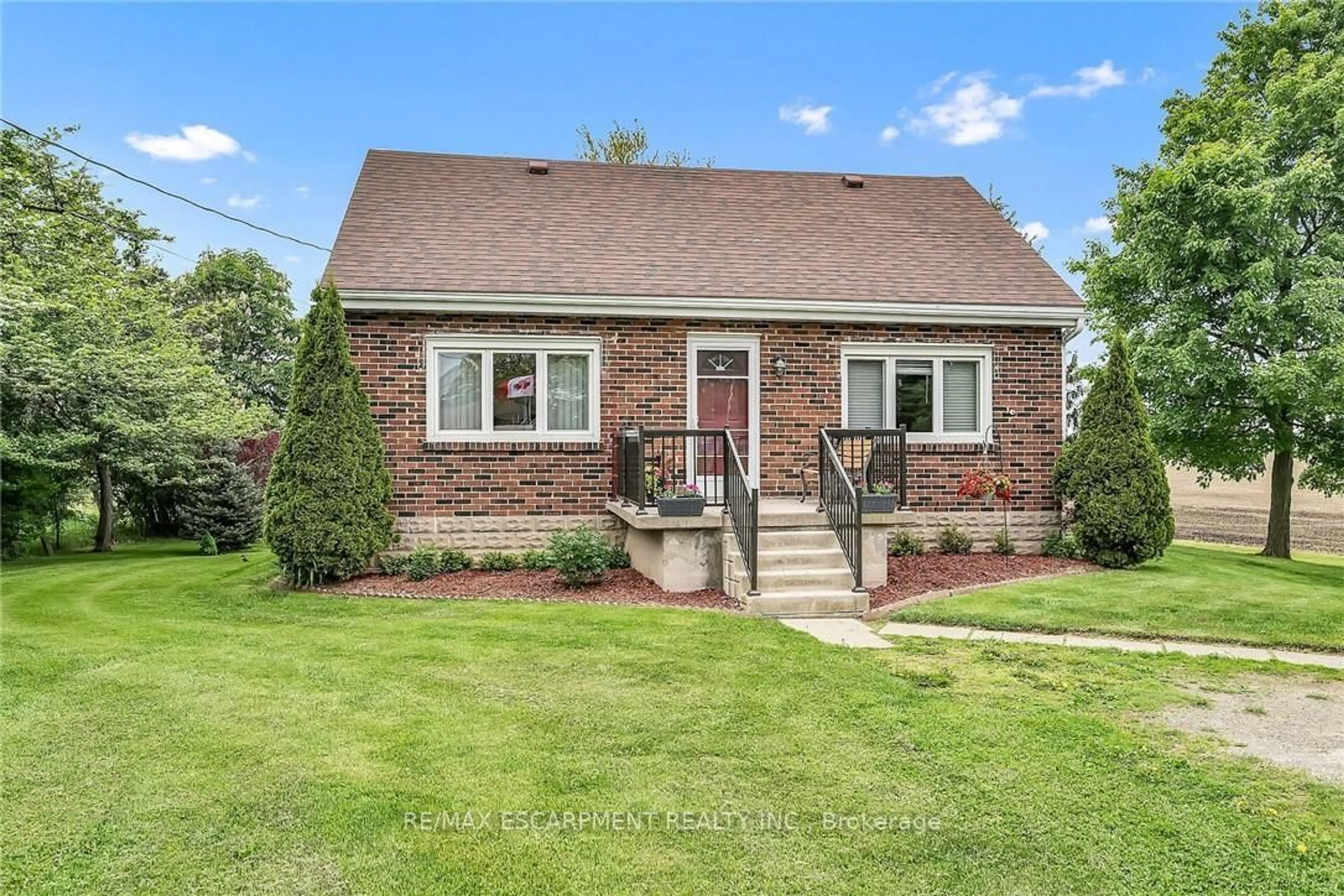 Home with brick exterior material, street for 2439 Wilson St, Hamilton Ontario L0R 1A0