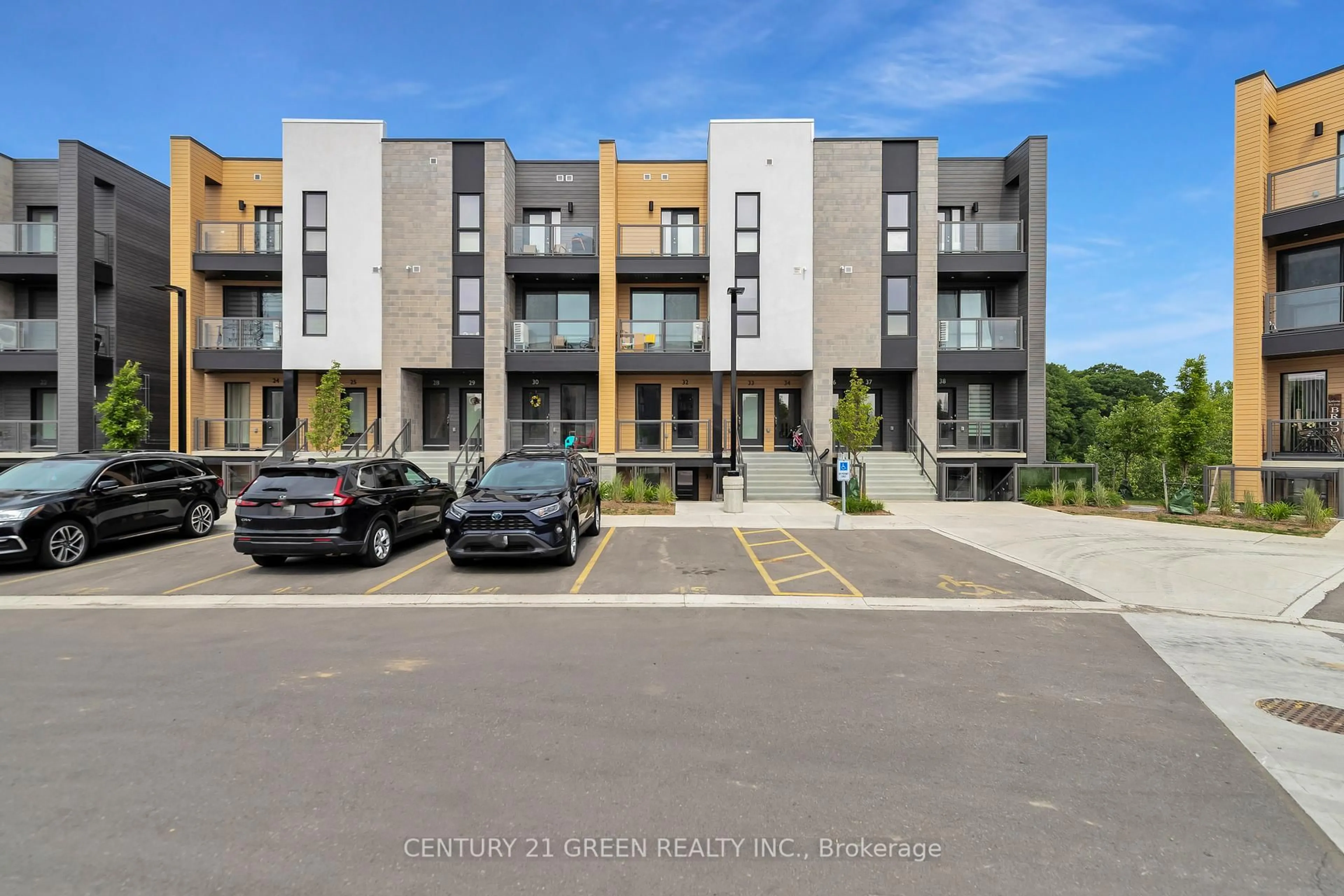 A pic from outside/outdoor area/front of a property/back of a property/a pic from drone, street for 261 Woodbine Ave #32, Kitchener Ontario N2R 0P7