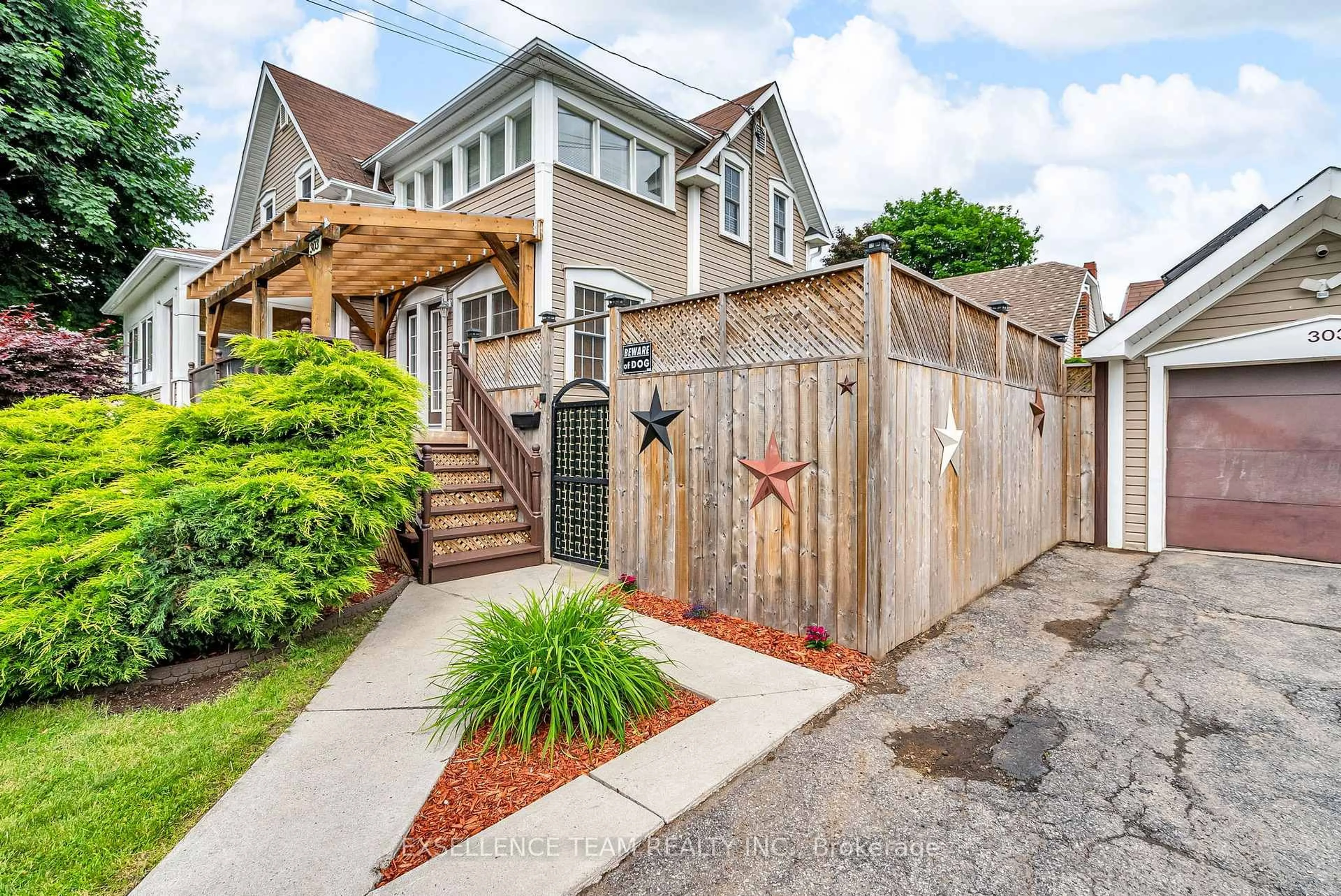 Home with brick exterior material, street for 303 Fifth St, Cornwall Ontario K6H 2L9