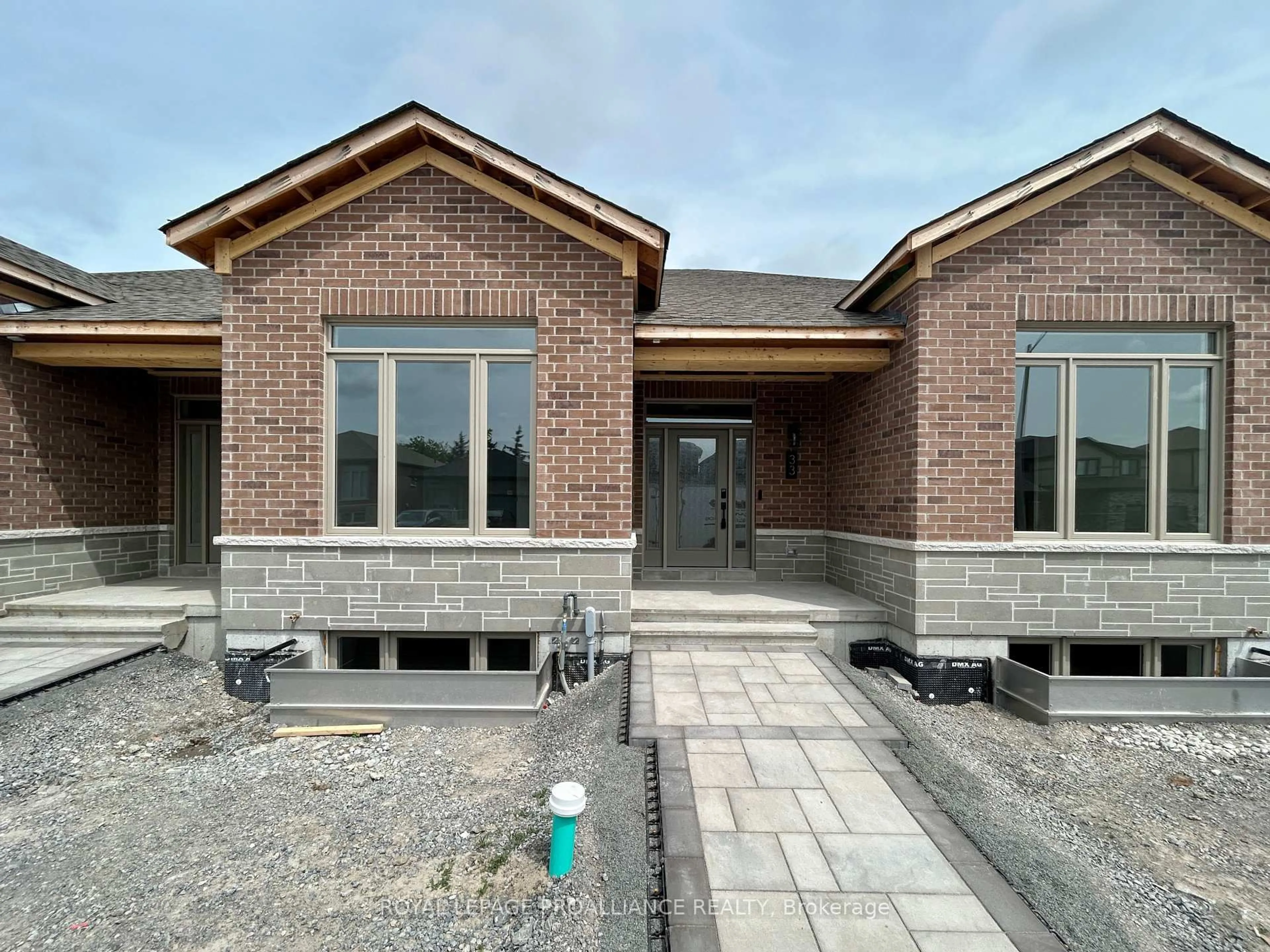 Home with brick exterior material, building for 33 Athabaska Dr, Belleville Ontario K8N 0T1