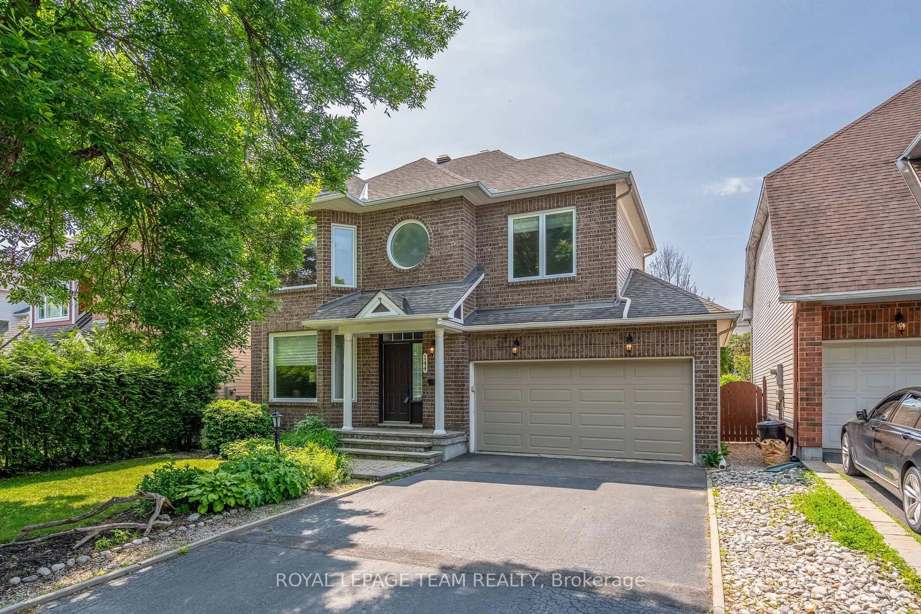 Home with brick exterior material, street for 144 Windhurst Dr, Nepean Ontario K2G 6K8