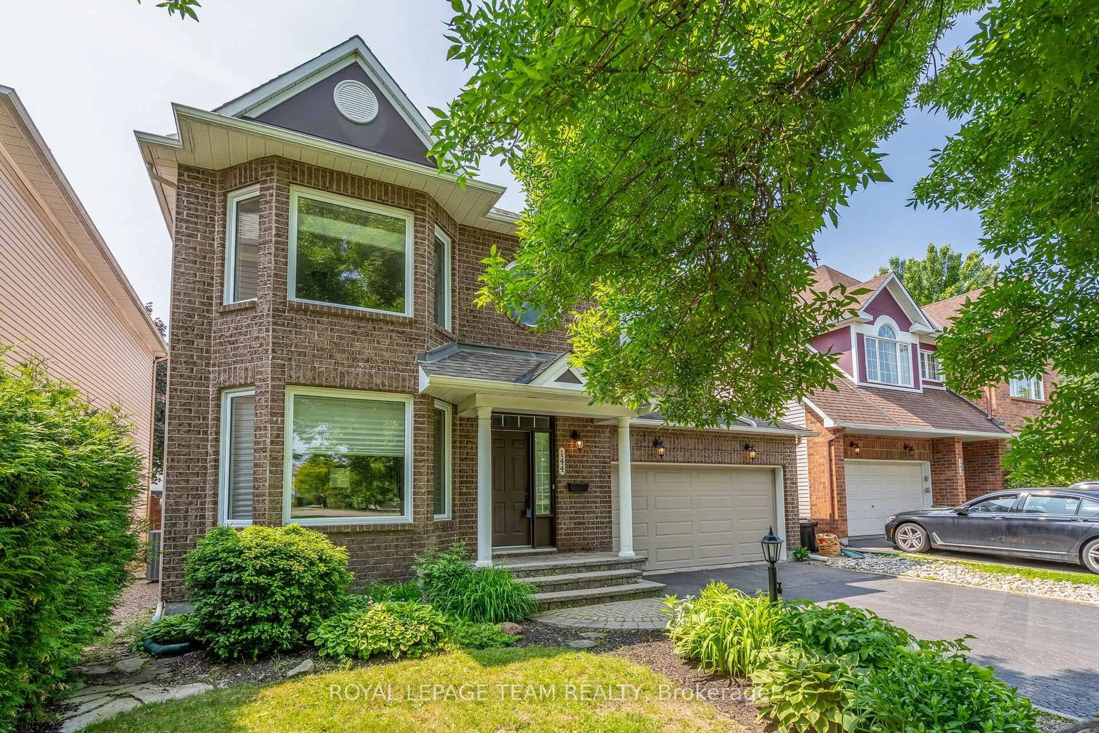 Home with brick exterior material, street for 144 Windhurst Dr, Nepean Ontario K2G 6K8