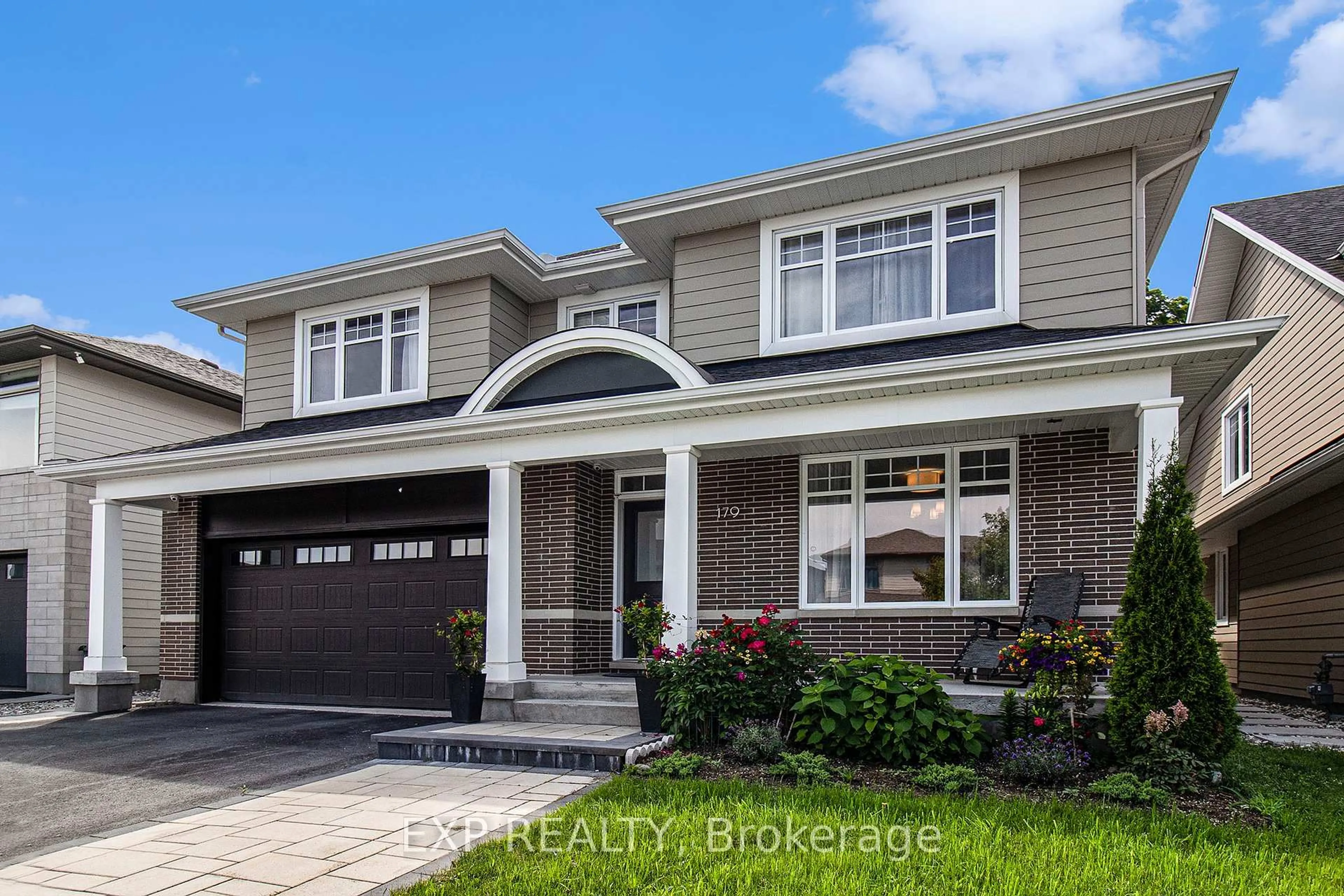 Home with brick exterior material, street for 179 Avro Circ, Ottawa Ontario K1K 4Y9