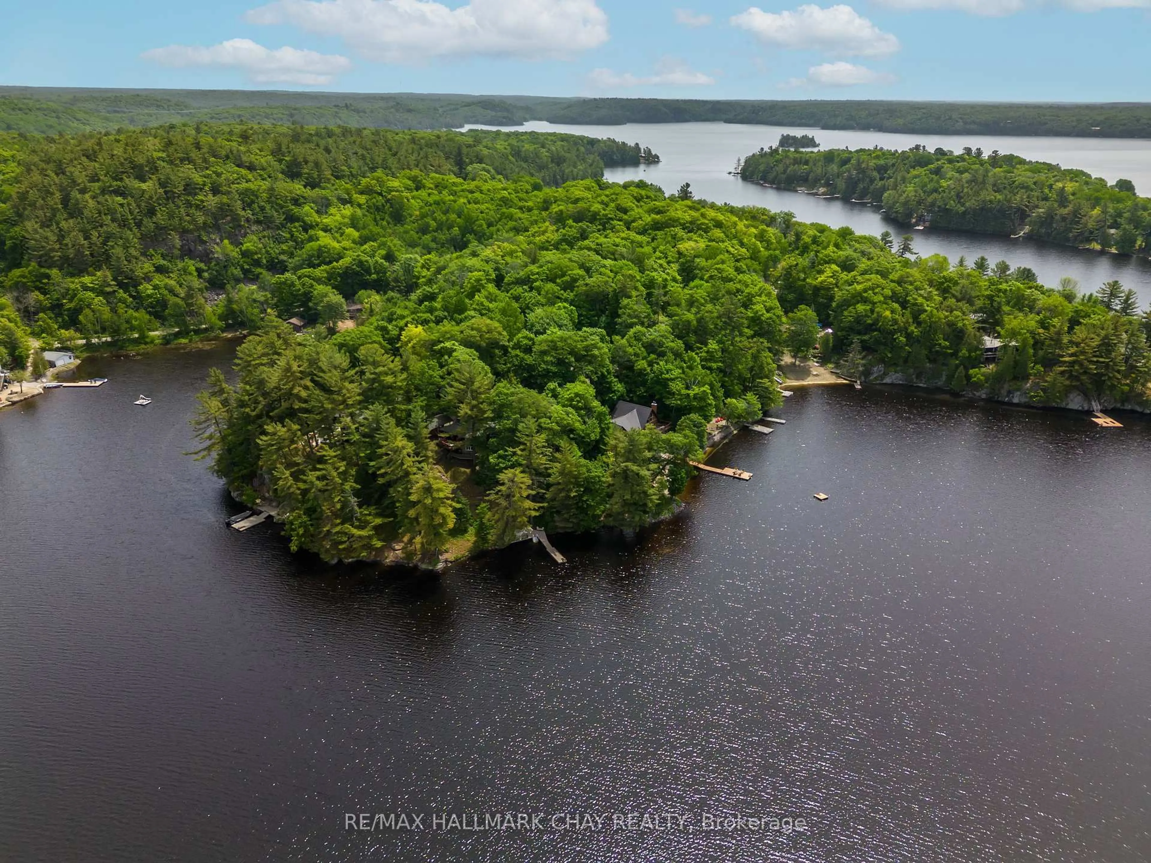 A pic from outside/outdoor area/front of a property/back of a property/a pic from drone, water/lake/river/ocean view for 8 eagle ridge Lane, McDougall Ontario P2A 2W9