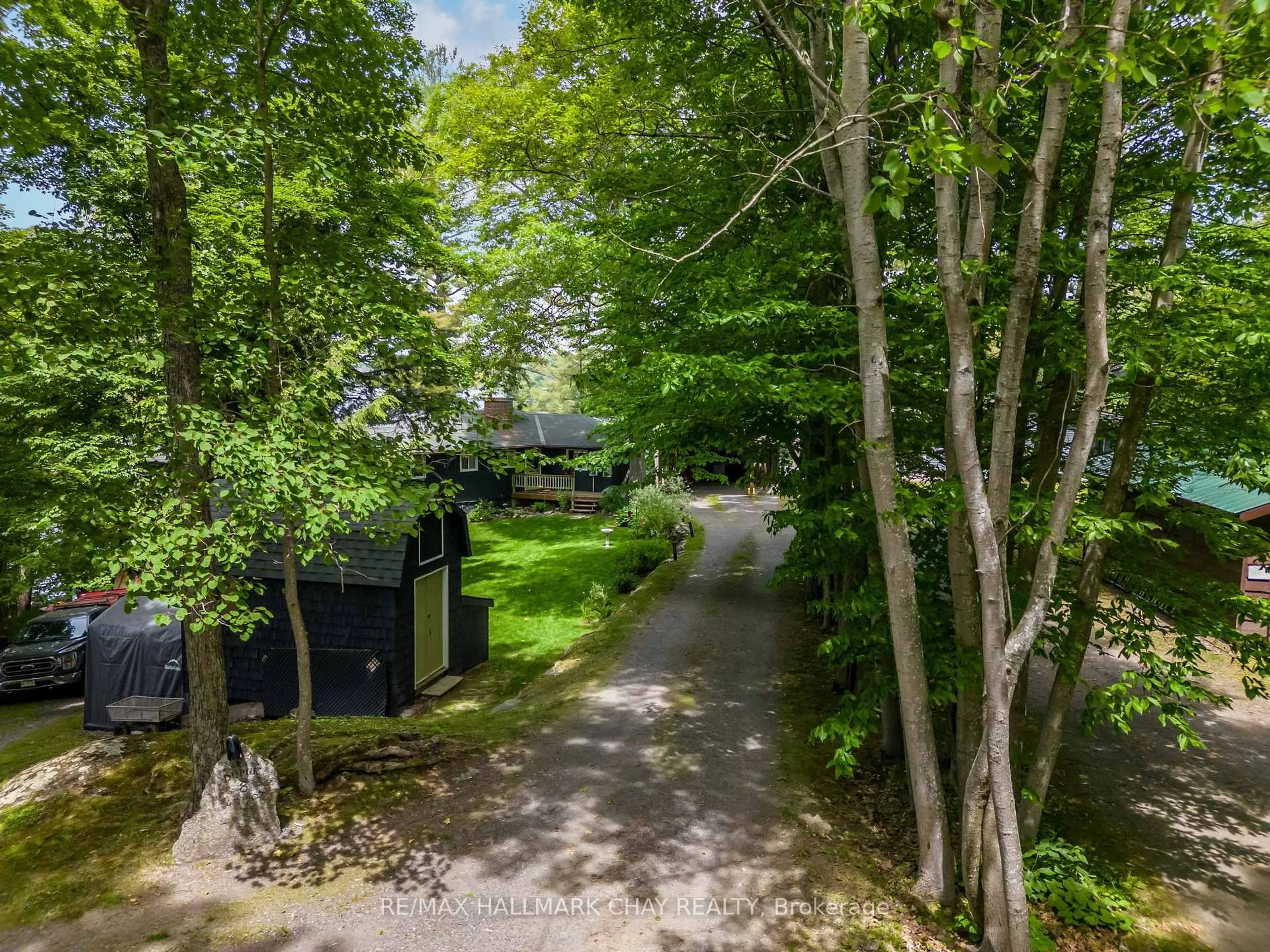 A pic from outside/outdoor area/front of a property/back of a property/a pic from drone, forest/trees view for 8 eagle ridge Lane, McDougall Ontario P2A 2W9