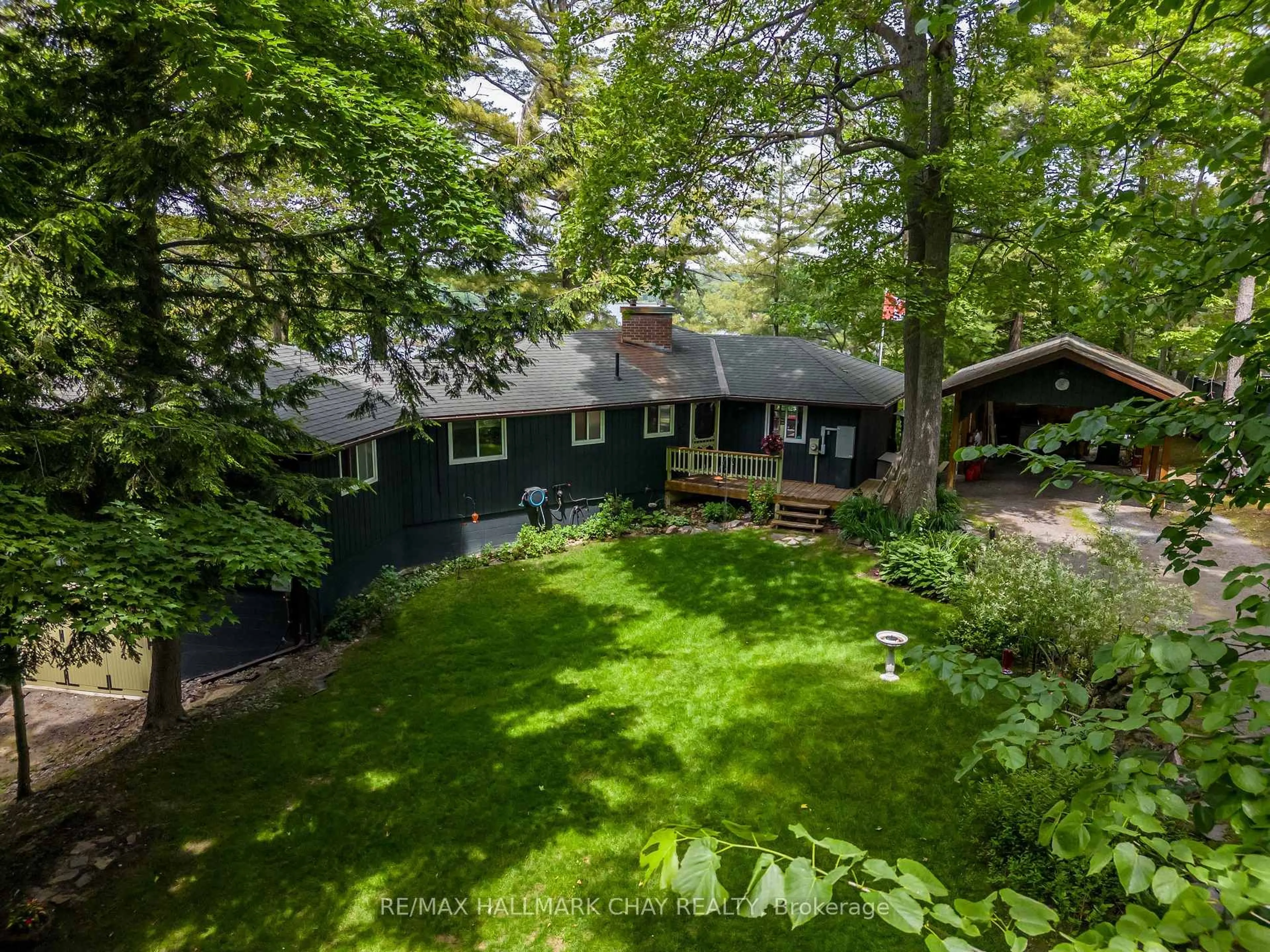 A pic from outside/outdoor area/front of a property/back of a property/a pic from drone, forest/trees view for 8 eagle ridge Lane, McDougall Ontario P2A 2W9