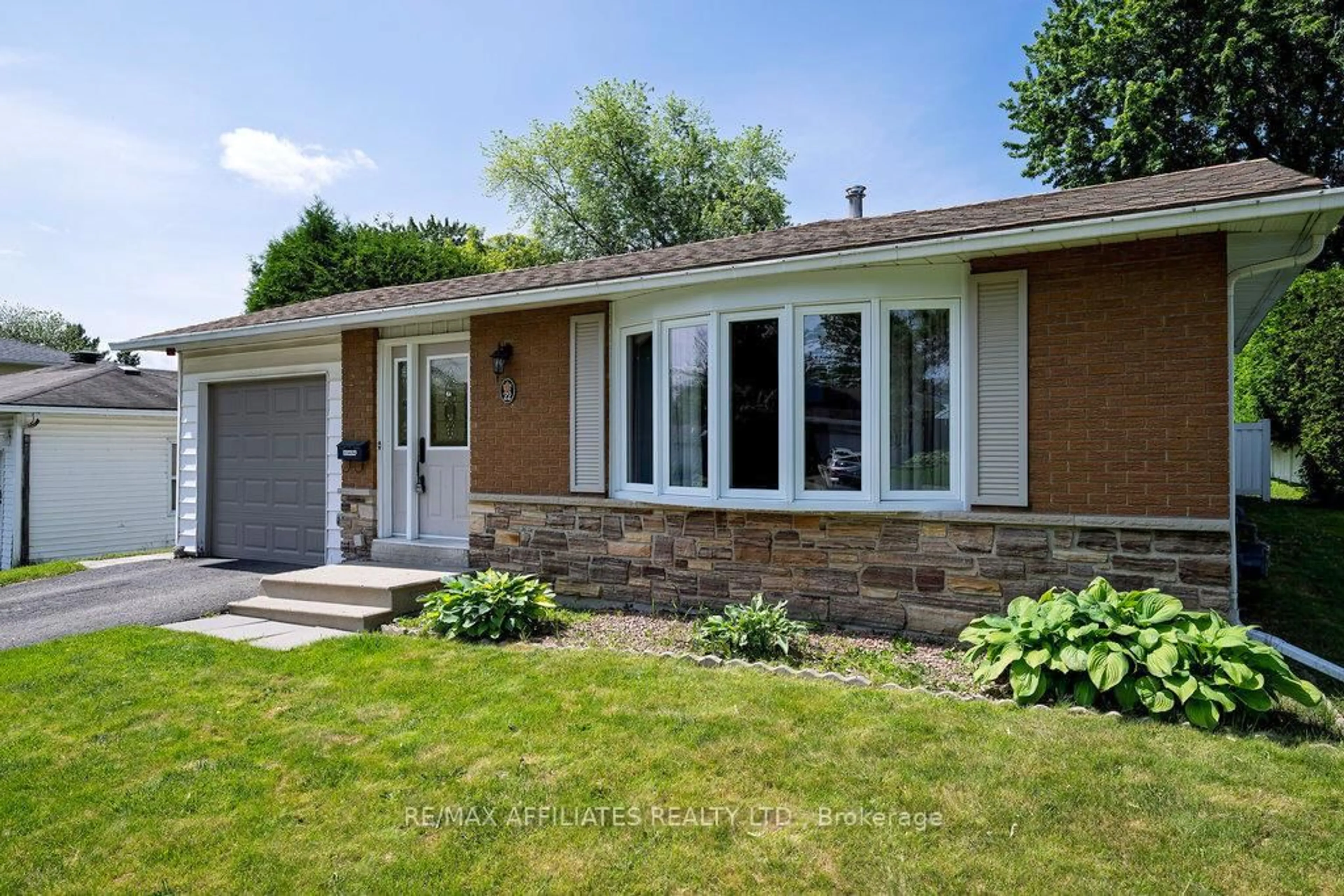 Home with brick exterior material, street for 22 Red Maple Cres, Ottawa Ontario K1B 3Z3