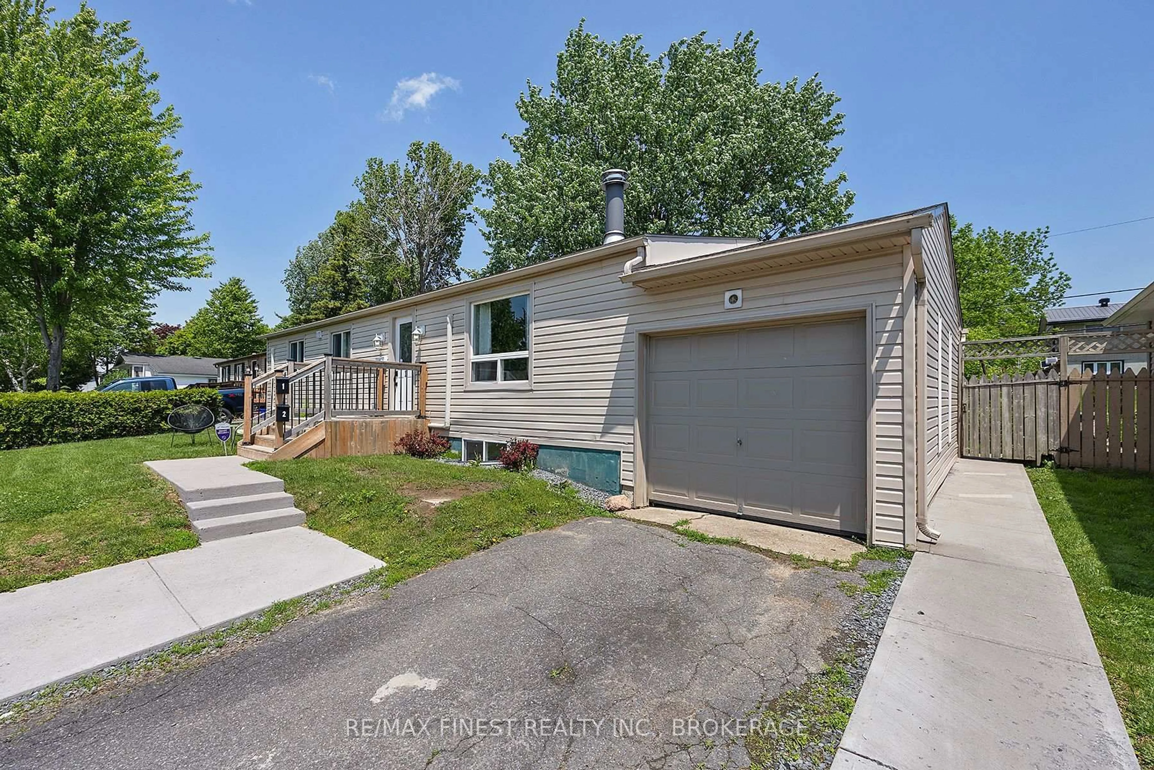 Home with vinyl exterior material, street for 35 Clairton Pl, Loyalist Ontario K7N 1R8
