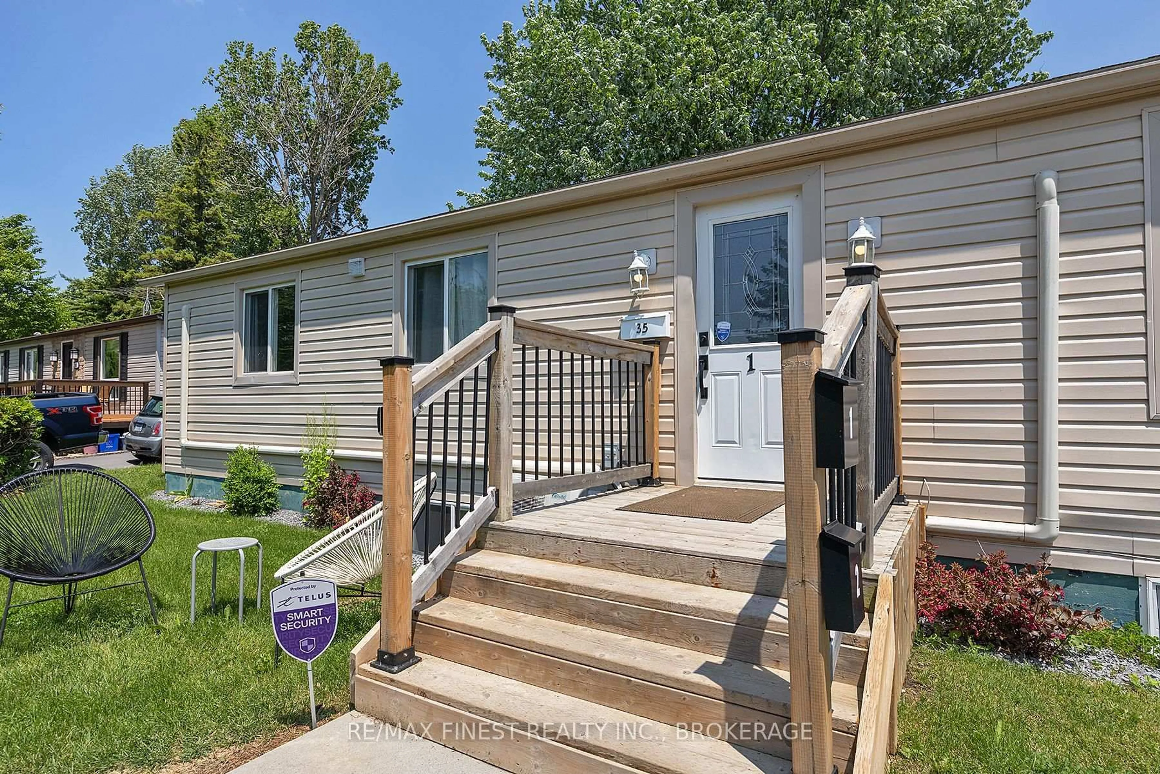 Home with vinyl exterior material, street for 35 Clairton Pl, Loyalist Ontario K7N 1R8