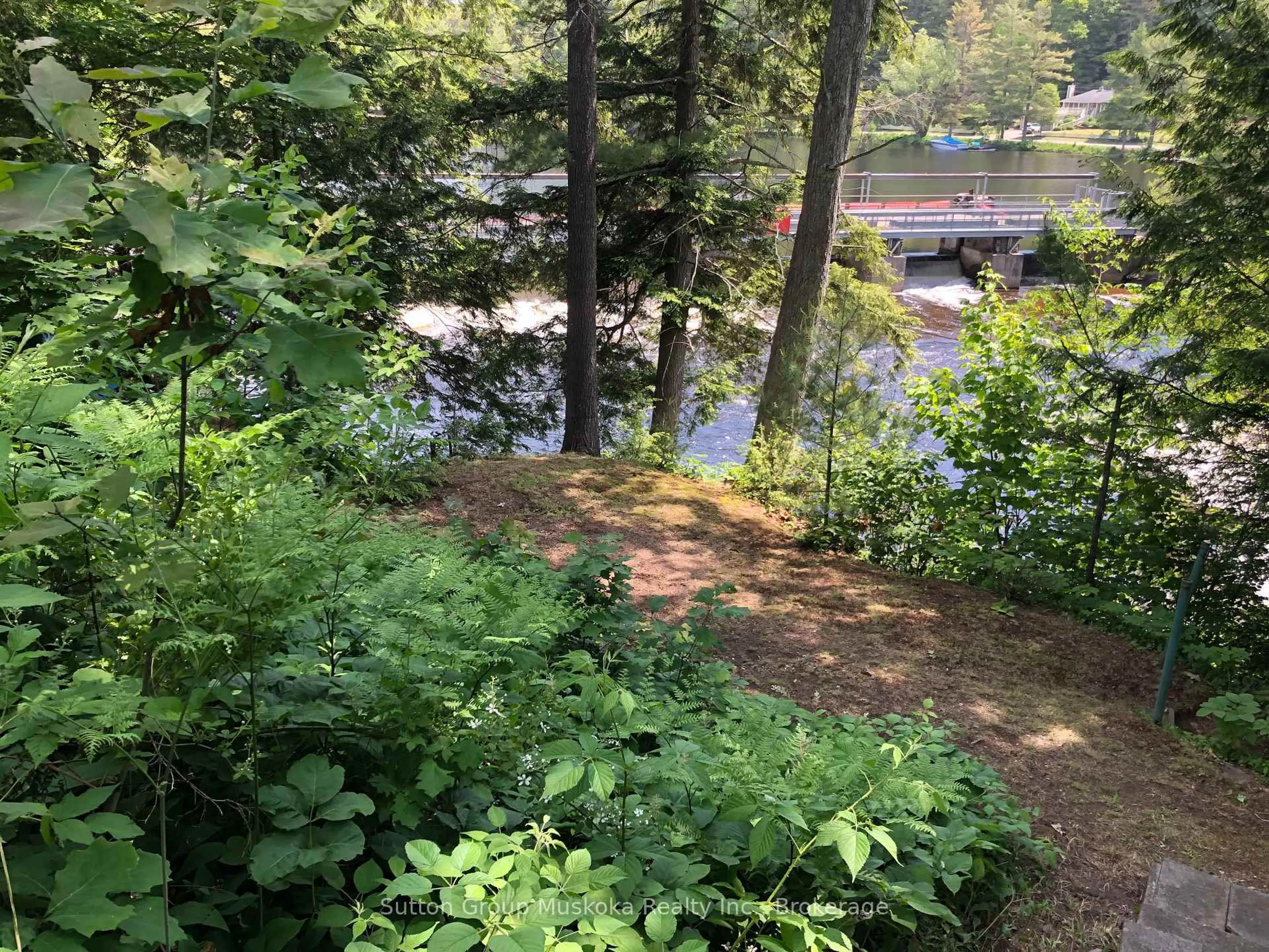 A pic from outside/outdoor area/front of a property/back of a property/a pic from drone, water/lake/river/ocean view for 726 Muskoka Rd 10 Rd, Huntsville Ontario P0B 1L0