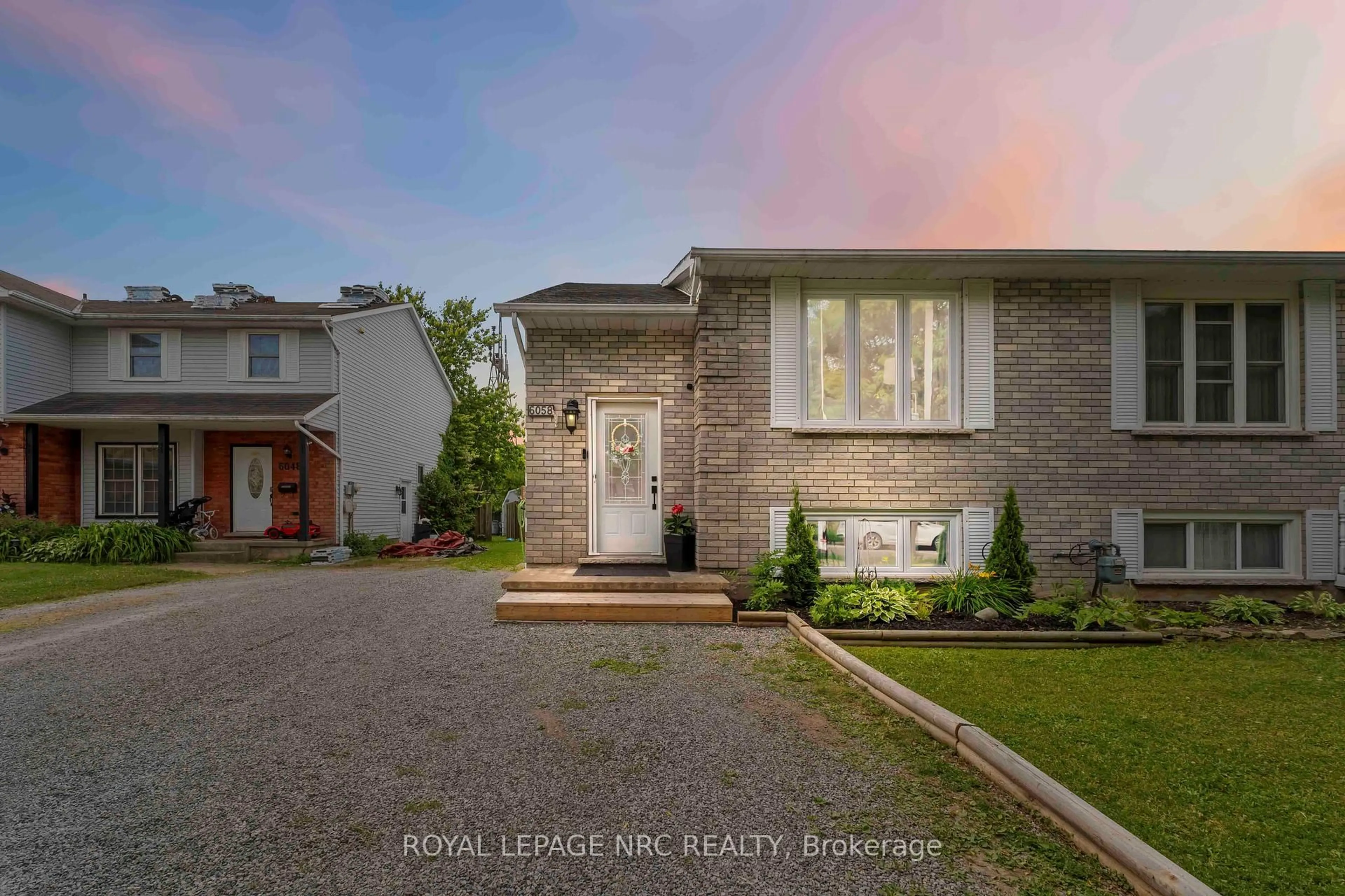 Home with brick exterior material, street for 6058 WILDROSE Cres, Niagara Falls Ontario L2G 7T2