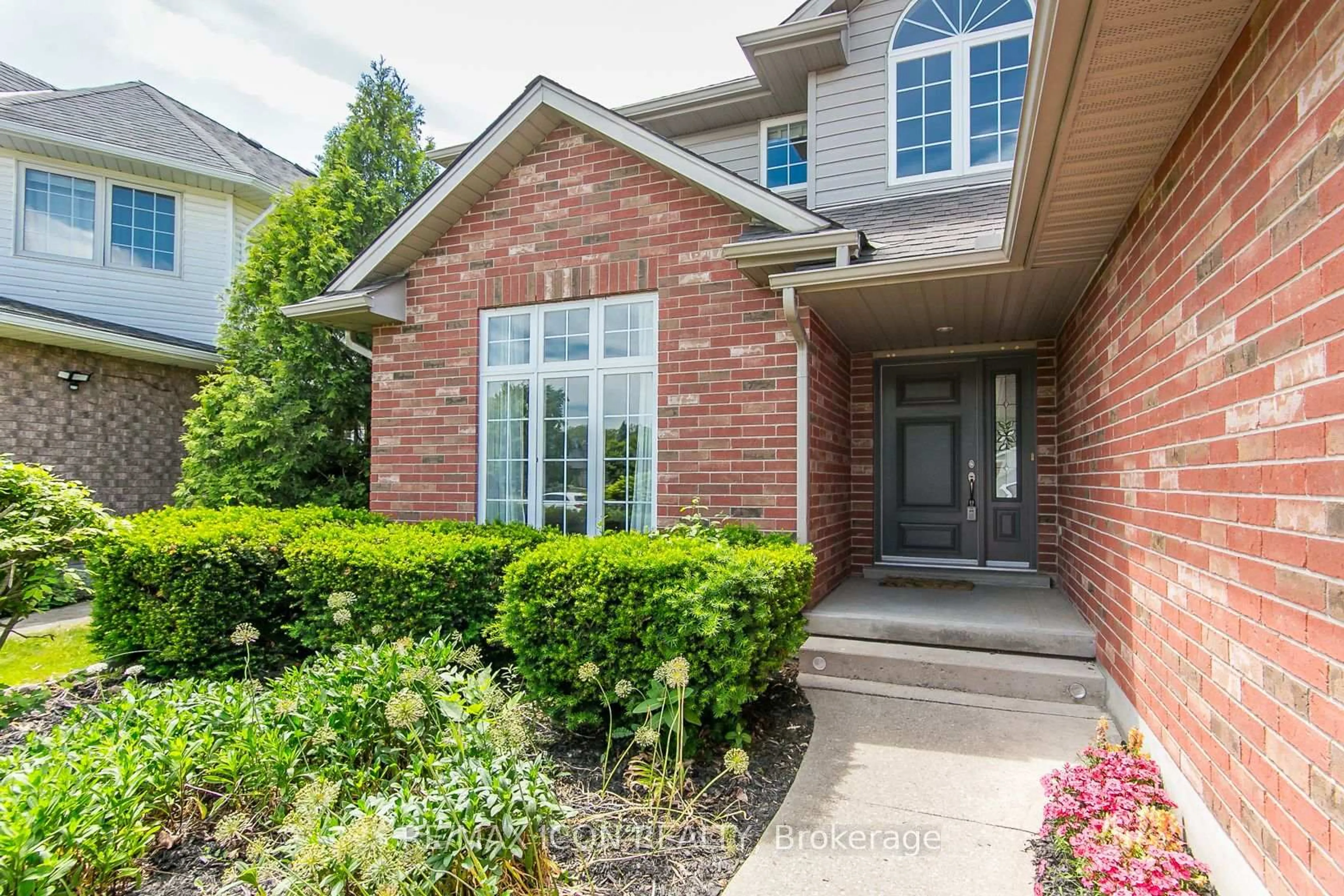 Home with brick exterior material, street for 18 Sandpiper Dr, Guelph Ontario N1C 1E2