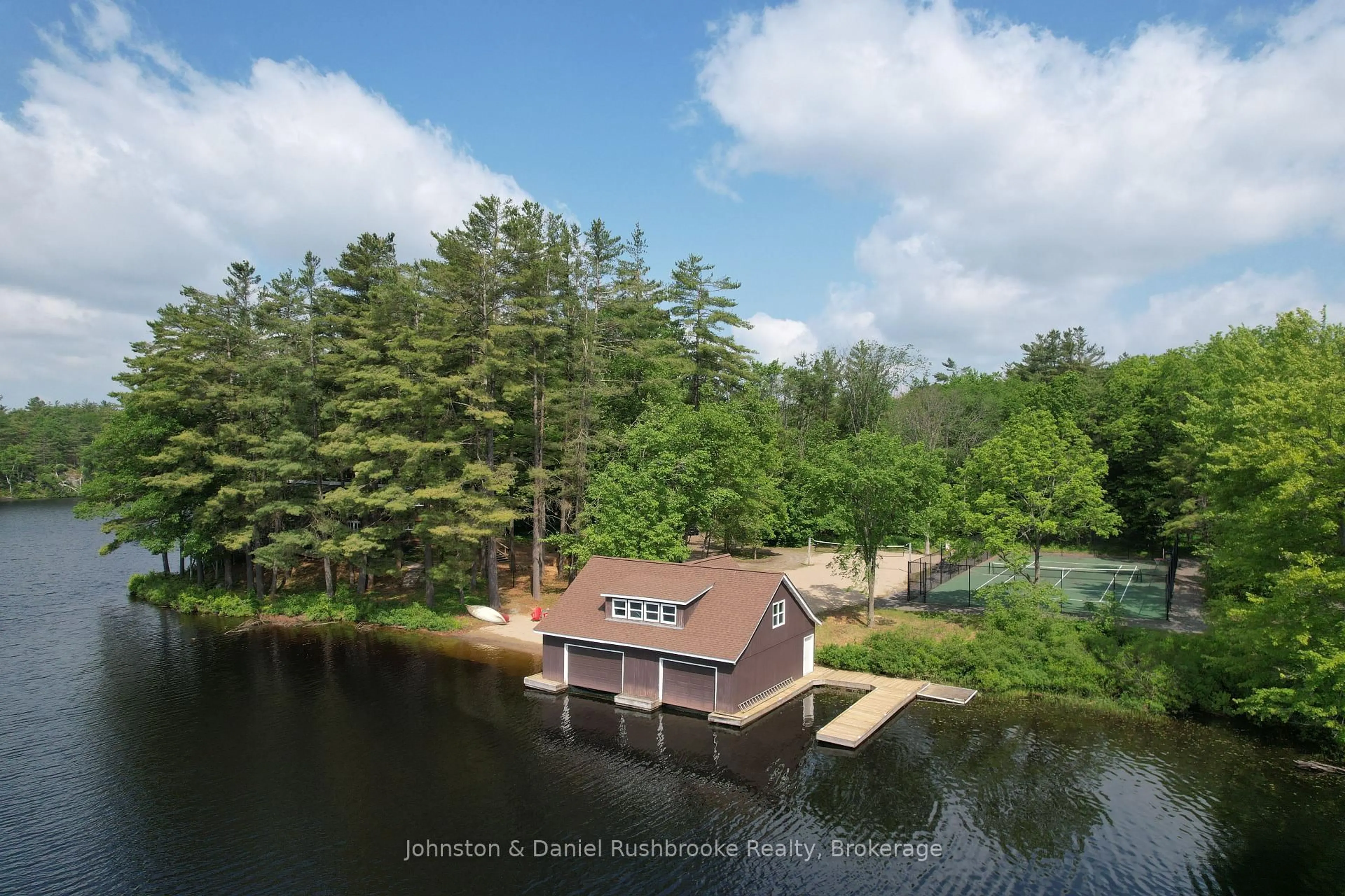 A pic from outside/outdoor area/front of a property/back of a property/a pic from drone, water/lake/river/ocean view for 1875 N Muldrew Lake Rd, Gravenhurst Ontario P1P 1R2