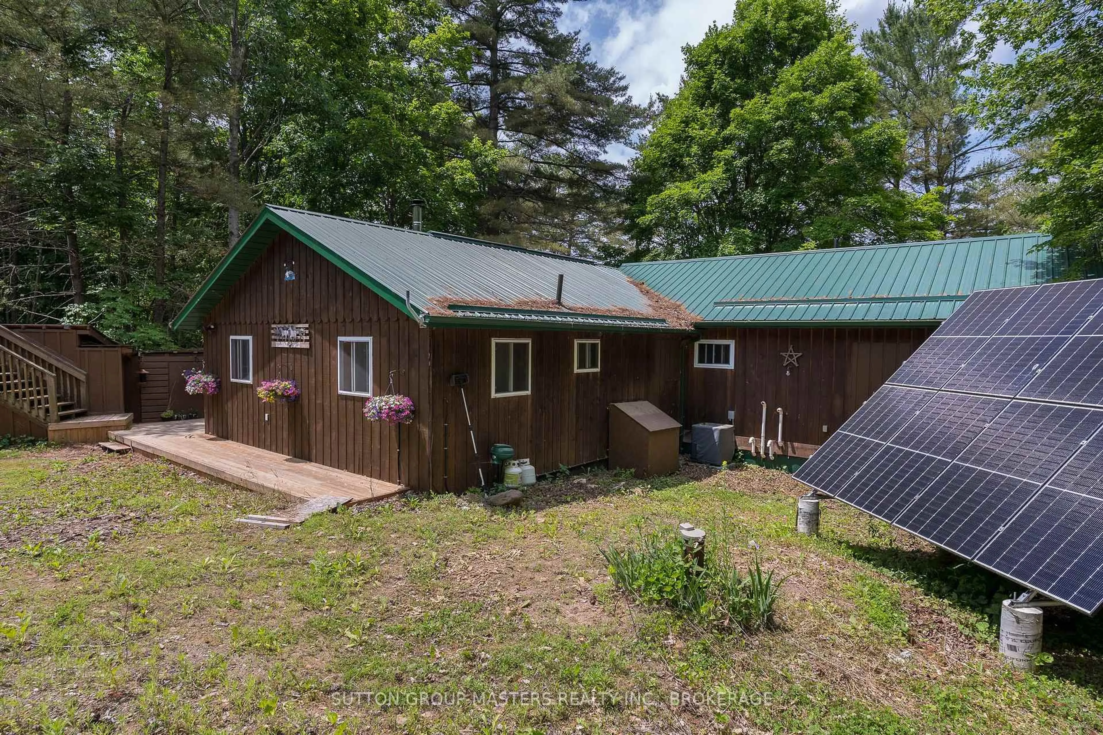 A pic from outside/outdoor area/front of a property/back of a property/a pic from drone, unknown for 313 Raccoon Lake Trail Rd, Kaladar Ontario K0H 1Z0