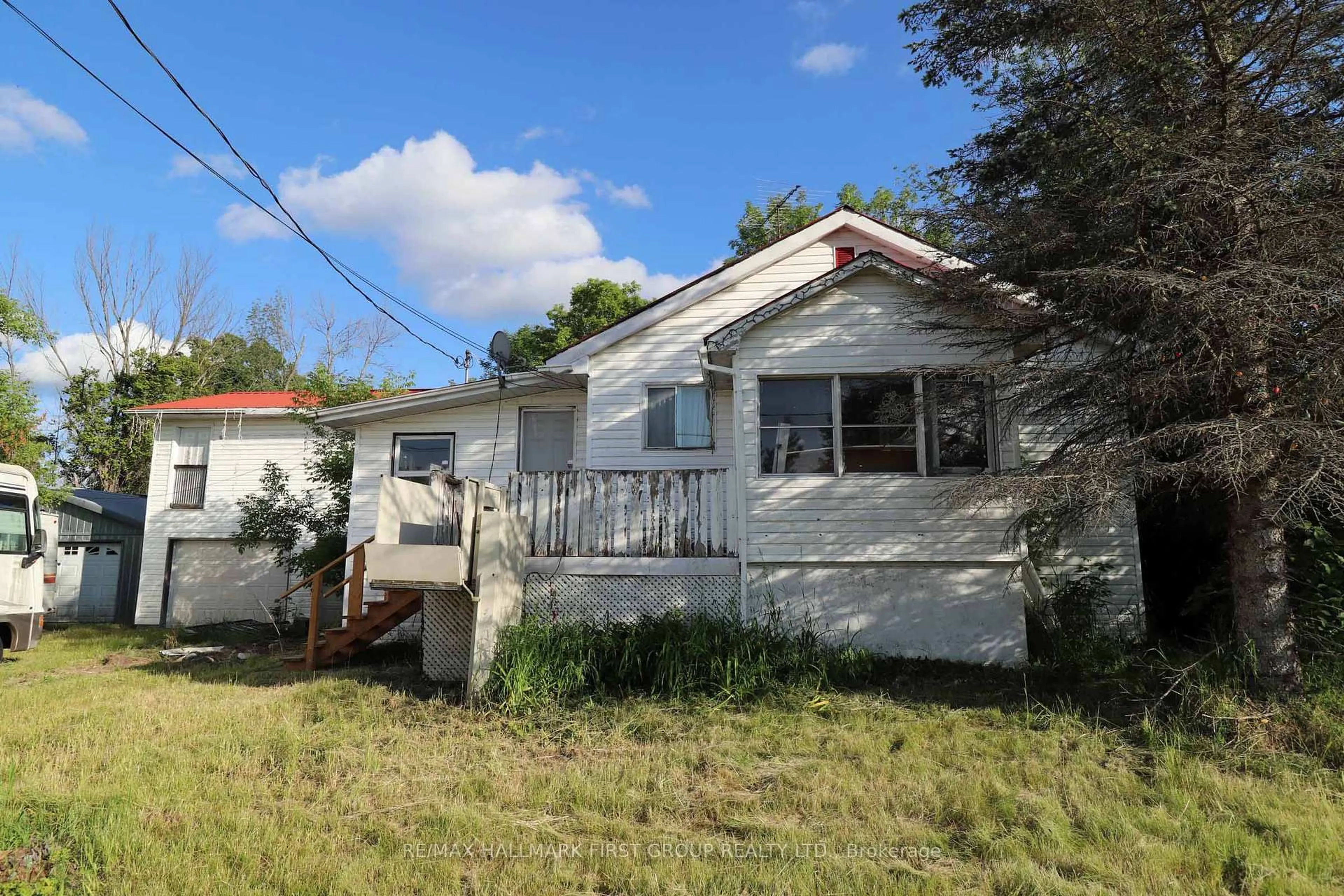 Home with vinyl exterior material, street for 1586 Sulphide Rd, Tweed Ontario K0K 3J0