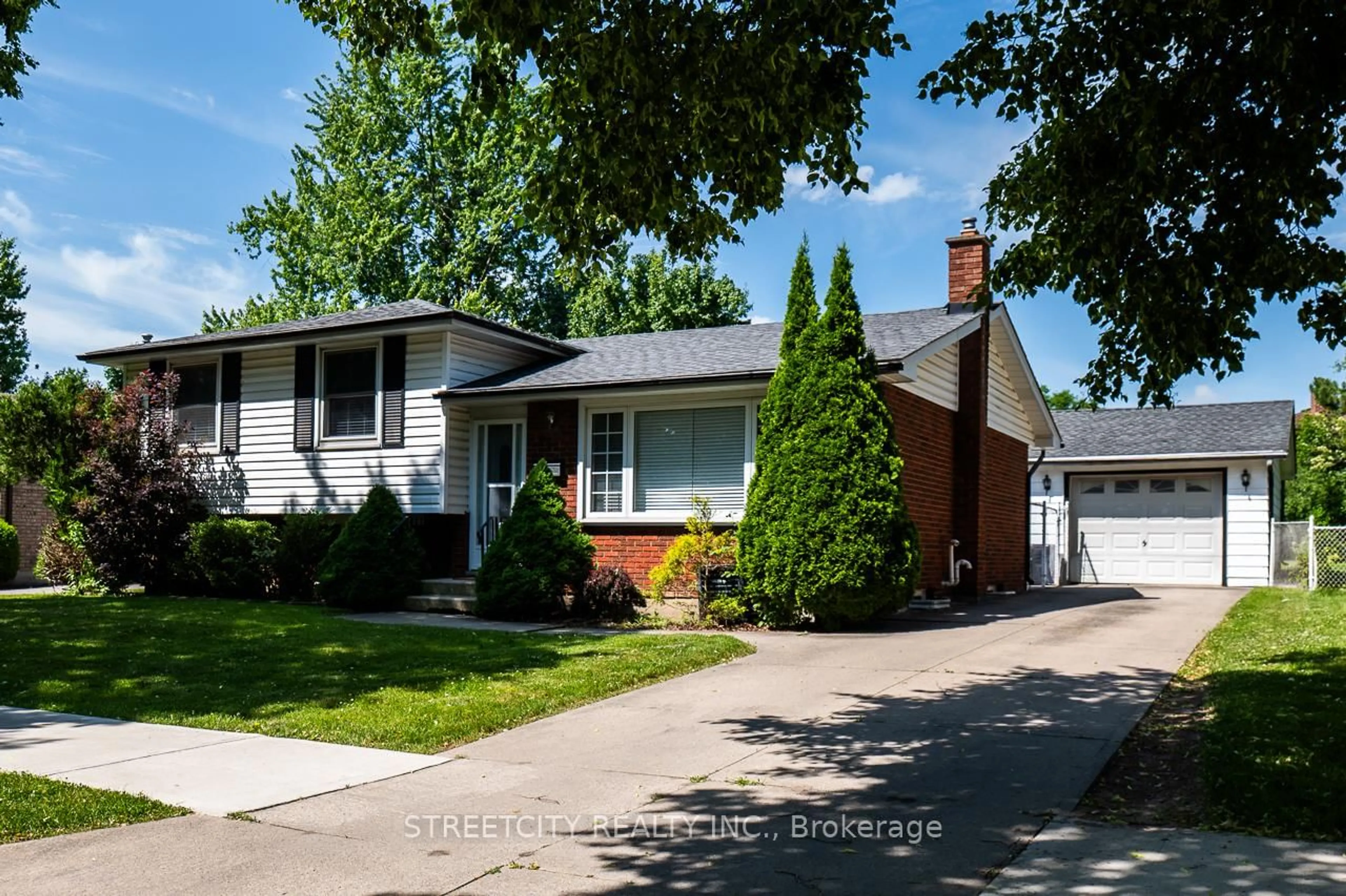 Home with brick exterior material, street for 729 Homestead Rd, London South Ontario N6C 4X7