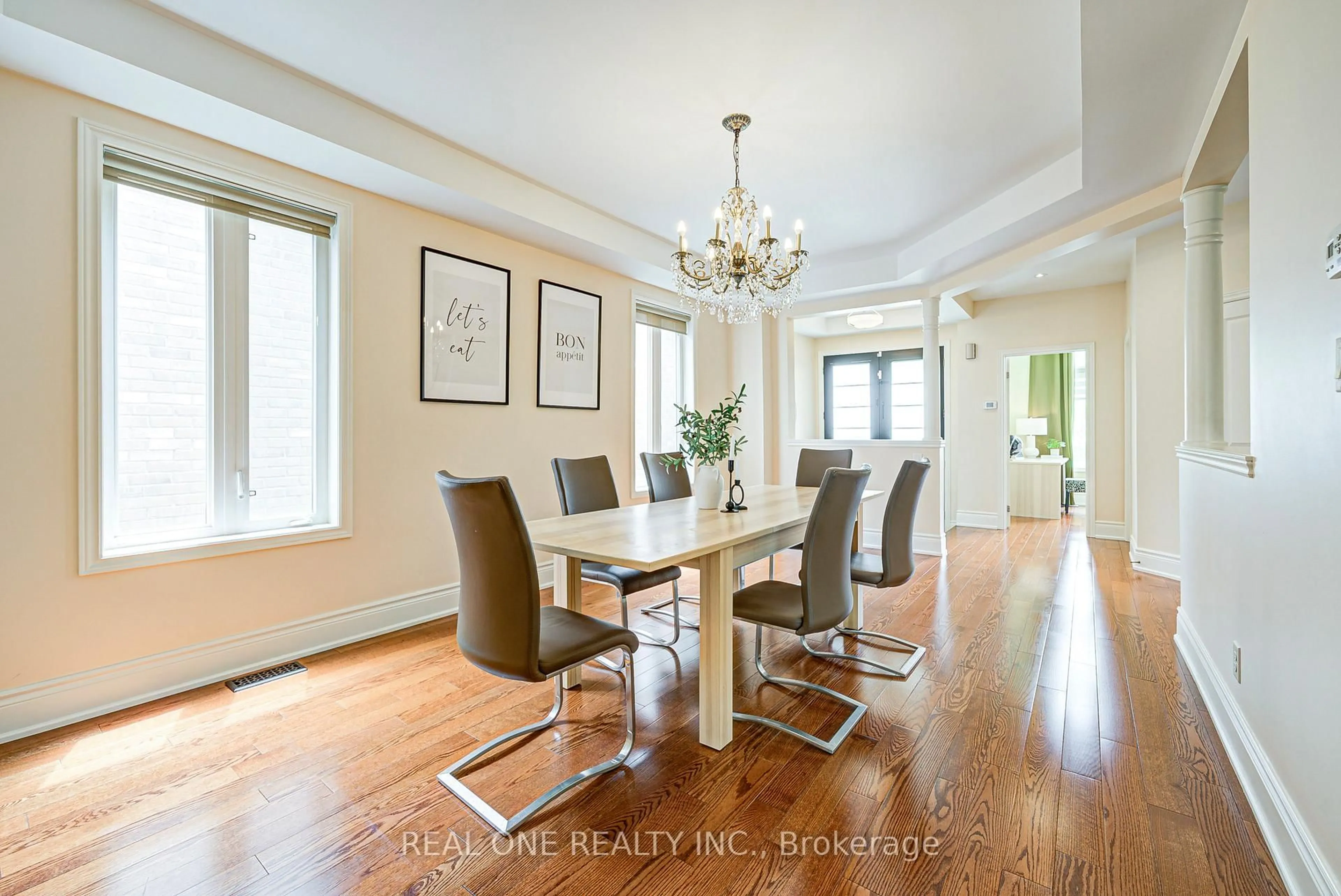 Dining room, wood/laminate floor for 112 Sutherland Cres, Hamilton Ontario L9K 0H2