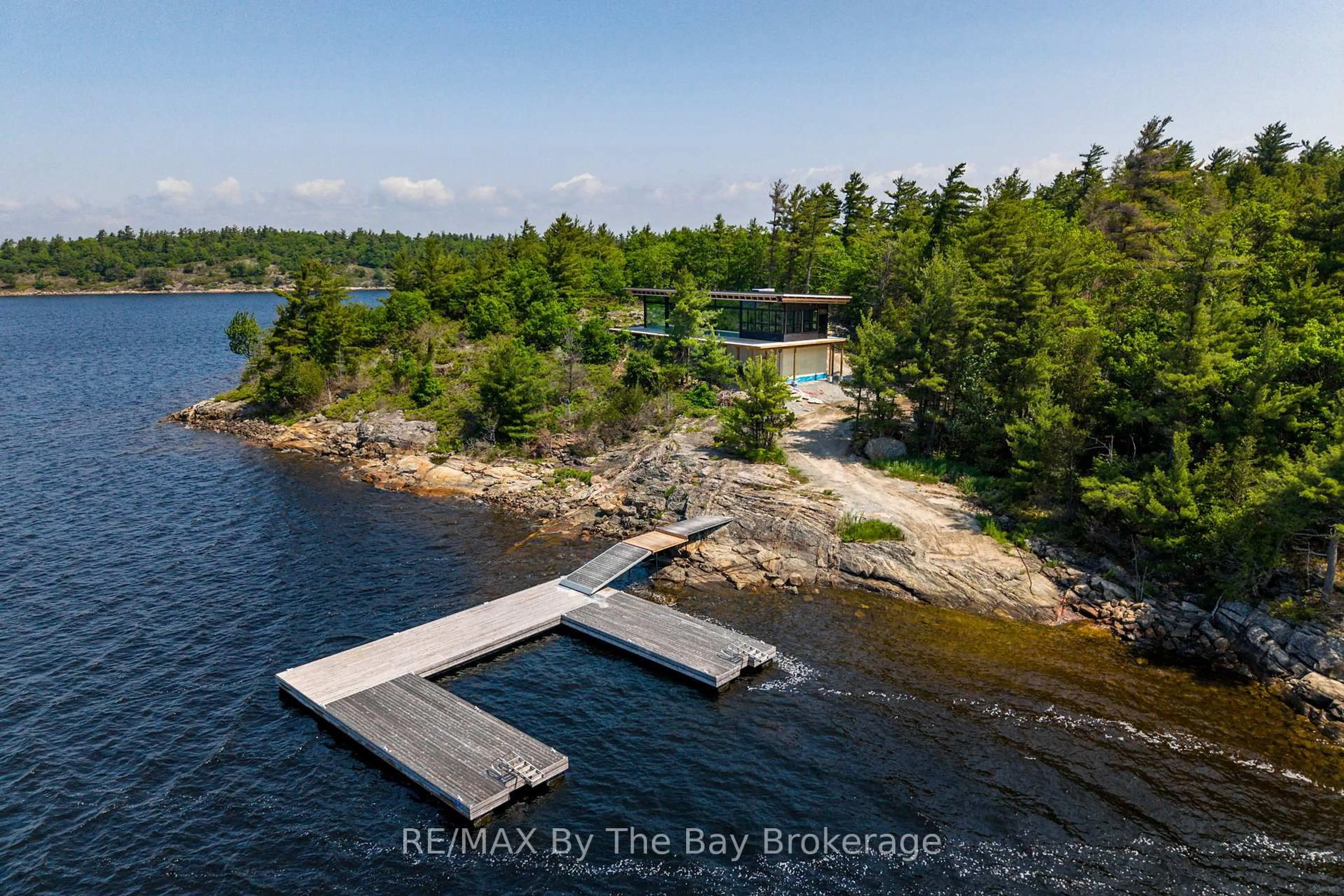 A pic from outside/outdoor area/front of a property/back of a property/a pic from drone, water/lake/river/ocean view for 11324 Island 1810/Bone Island, Georgian Bay Ontario L0K 1S0
