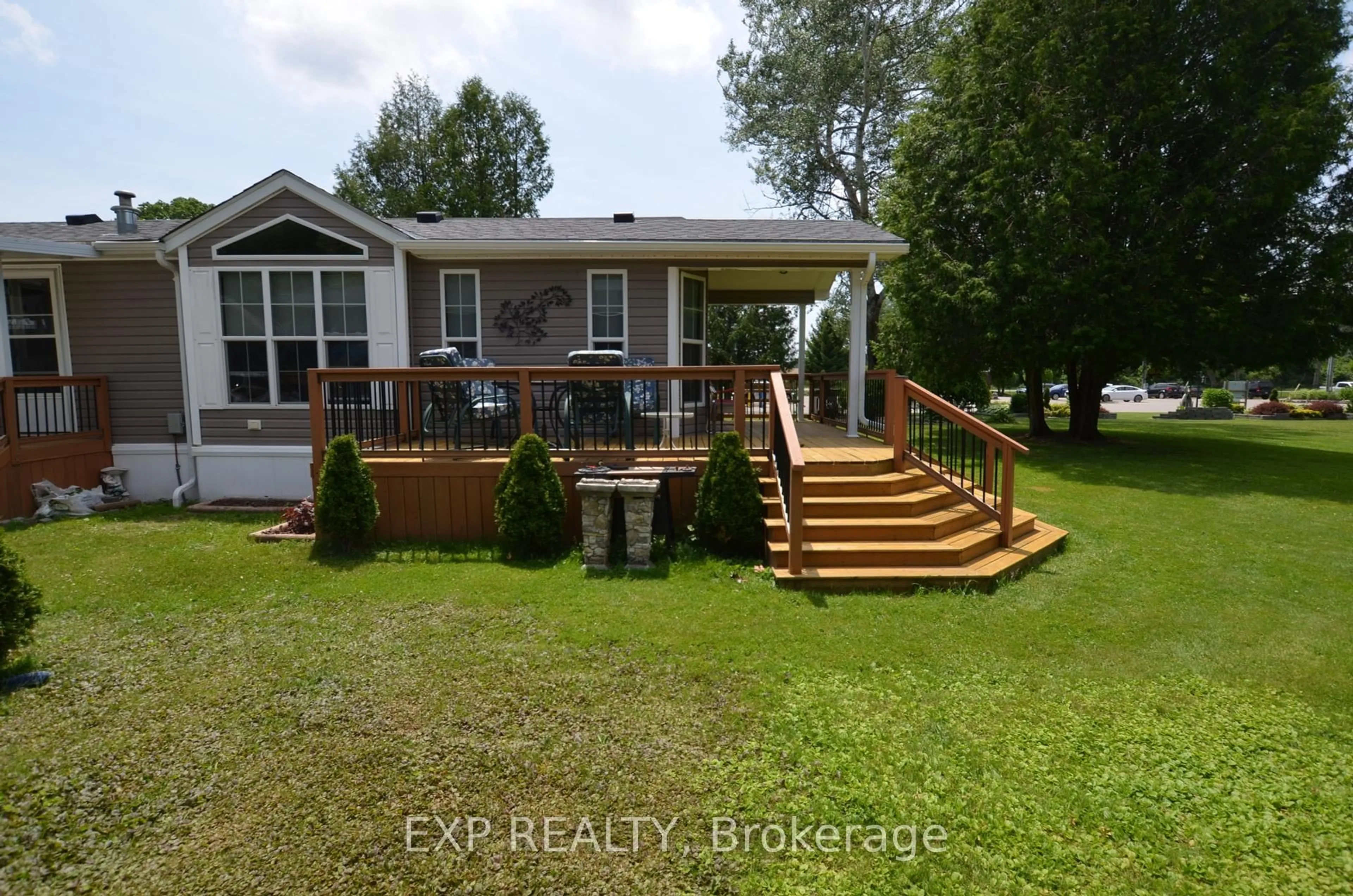 A pic from outside/outdoor area/front of a property/back of a property/a pic from drone, water/lake/river/ocean view for 22790 Amiens Rd #46, Middlesex Centre Ontario N0L 1R0