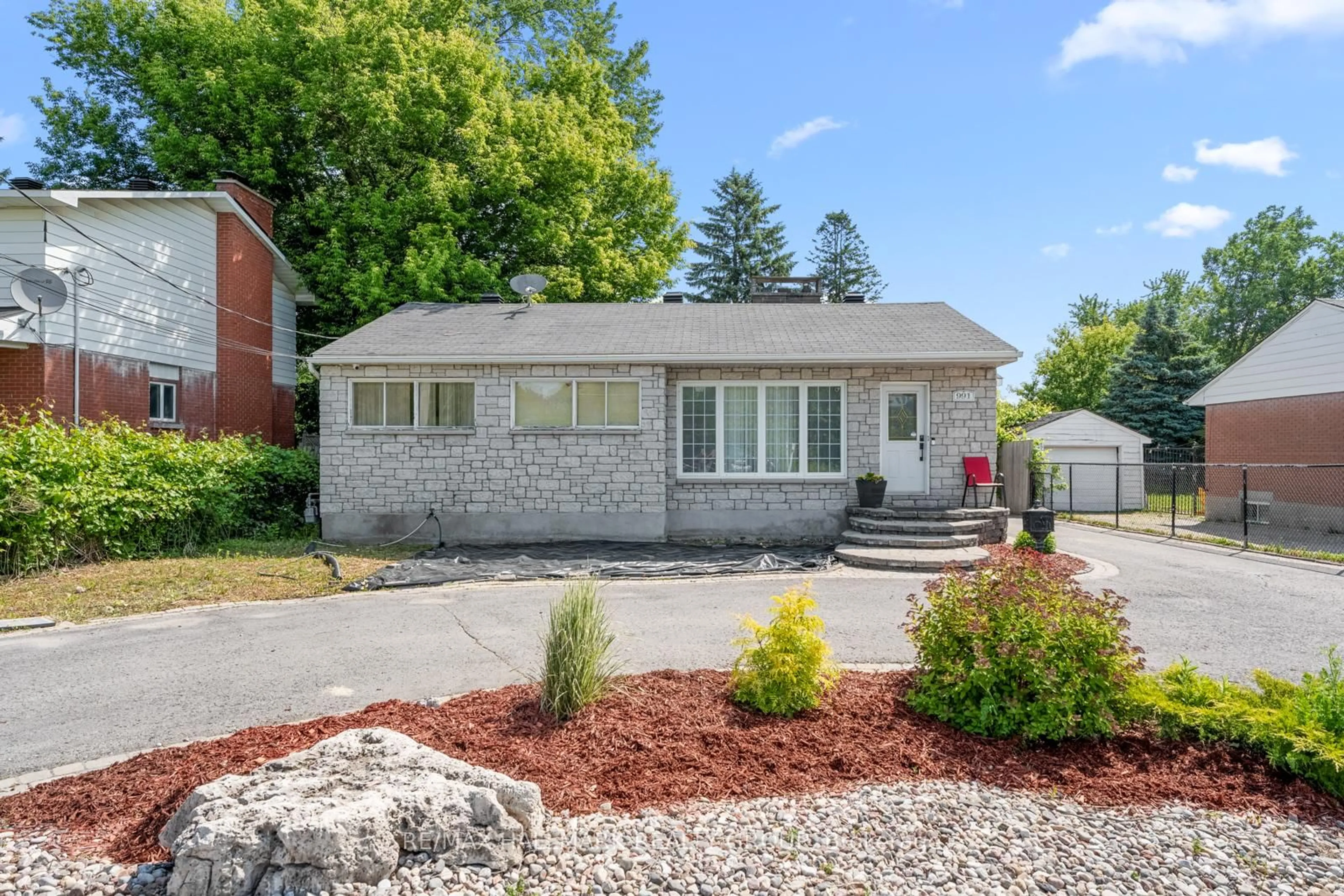 Home with brick exterior material, street for 991 BLAIR Rd, Ottawa Ontario K1J 7M9