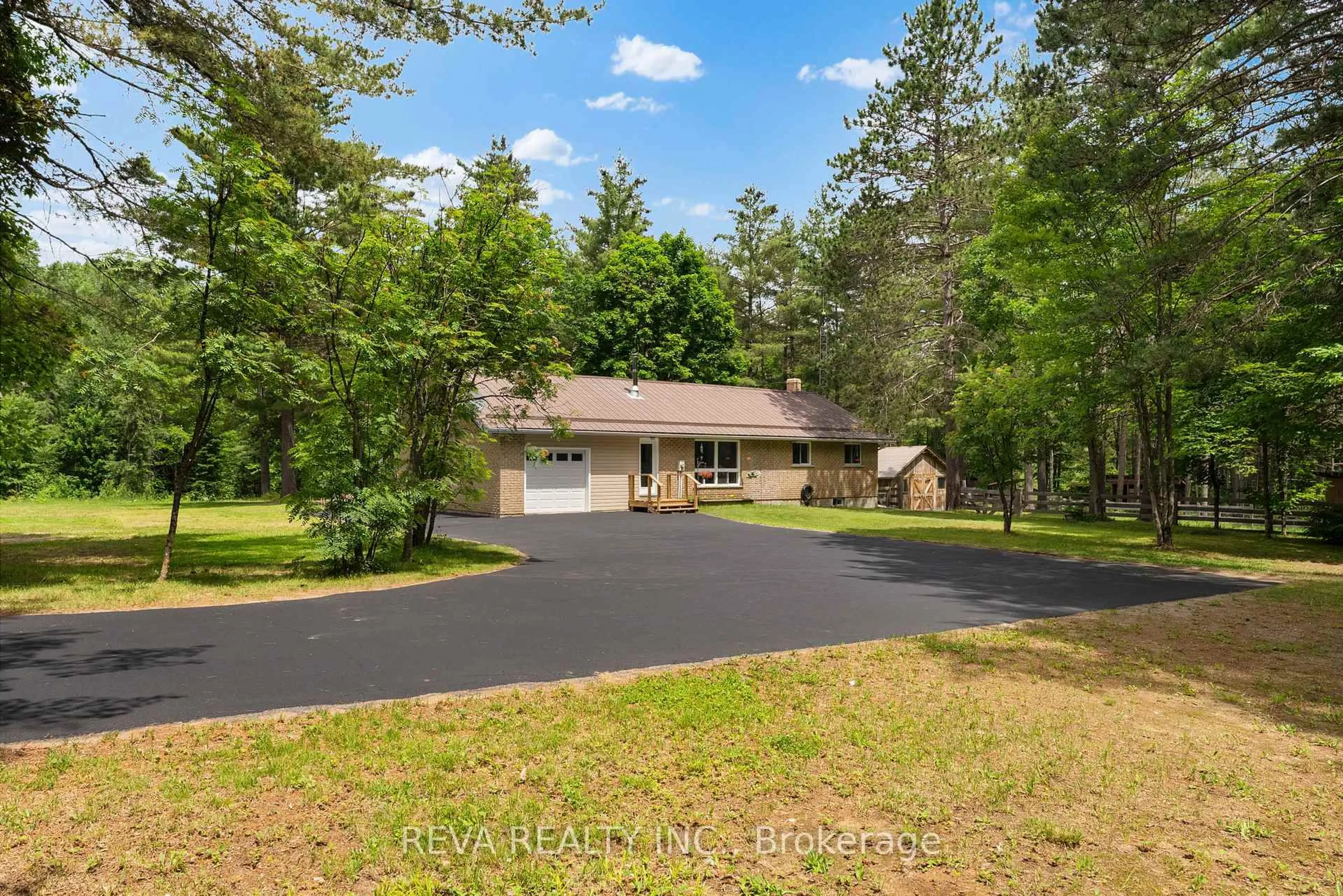 A pic from outside/outdoor area/front of a property/back of a property/a pic from drone, water/lake/river/ocean view for 32 Papineau Lake Rd, Maple Leaf Ontario K0L 2R0